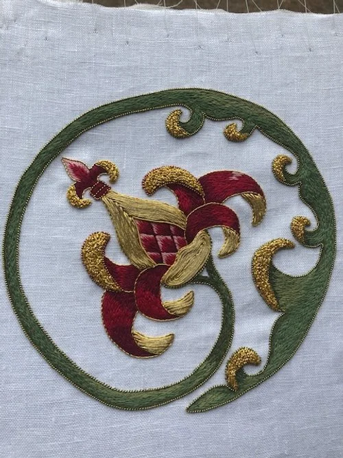 Silk embroidery incorporating metal thread techniques outside the context of Opus Anglicanum.