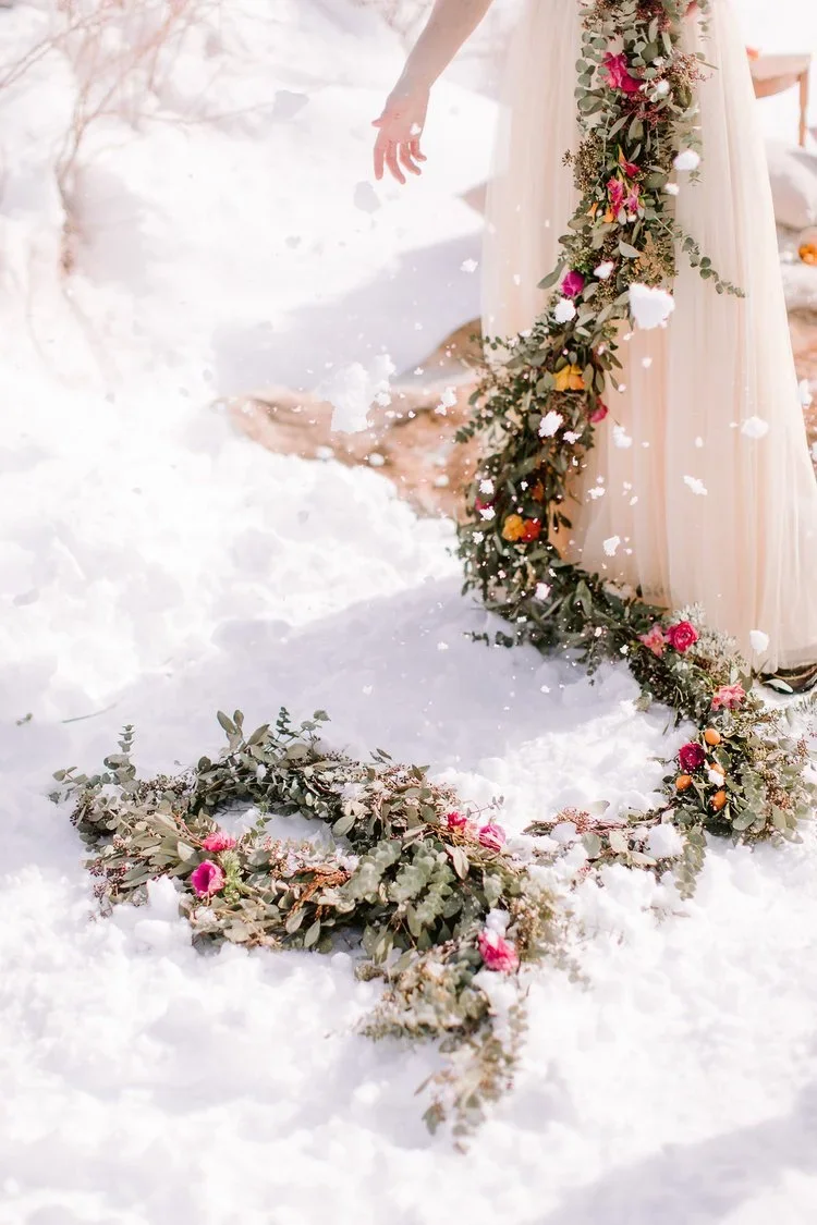 Heirlooms+shoot_floral+garland+with+snow+falling.webp