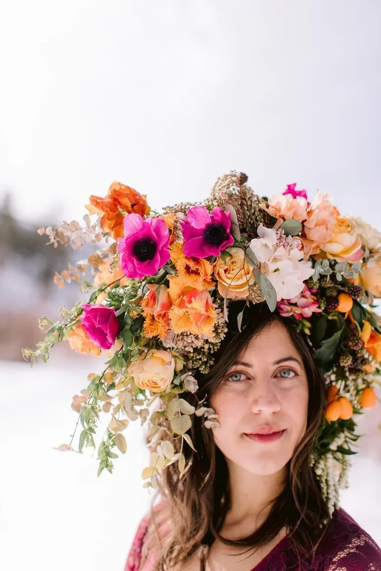 Heirlooms_Victoria+in+floral+head+piece+up+close+with+eyes+open.webp