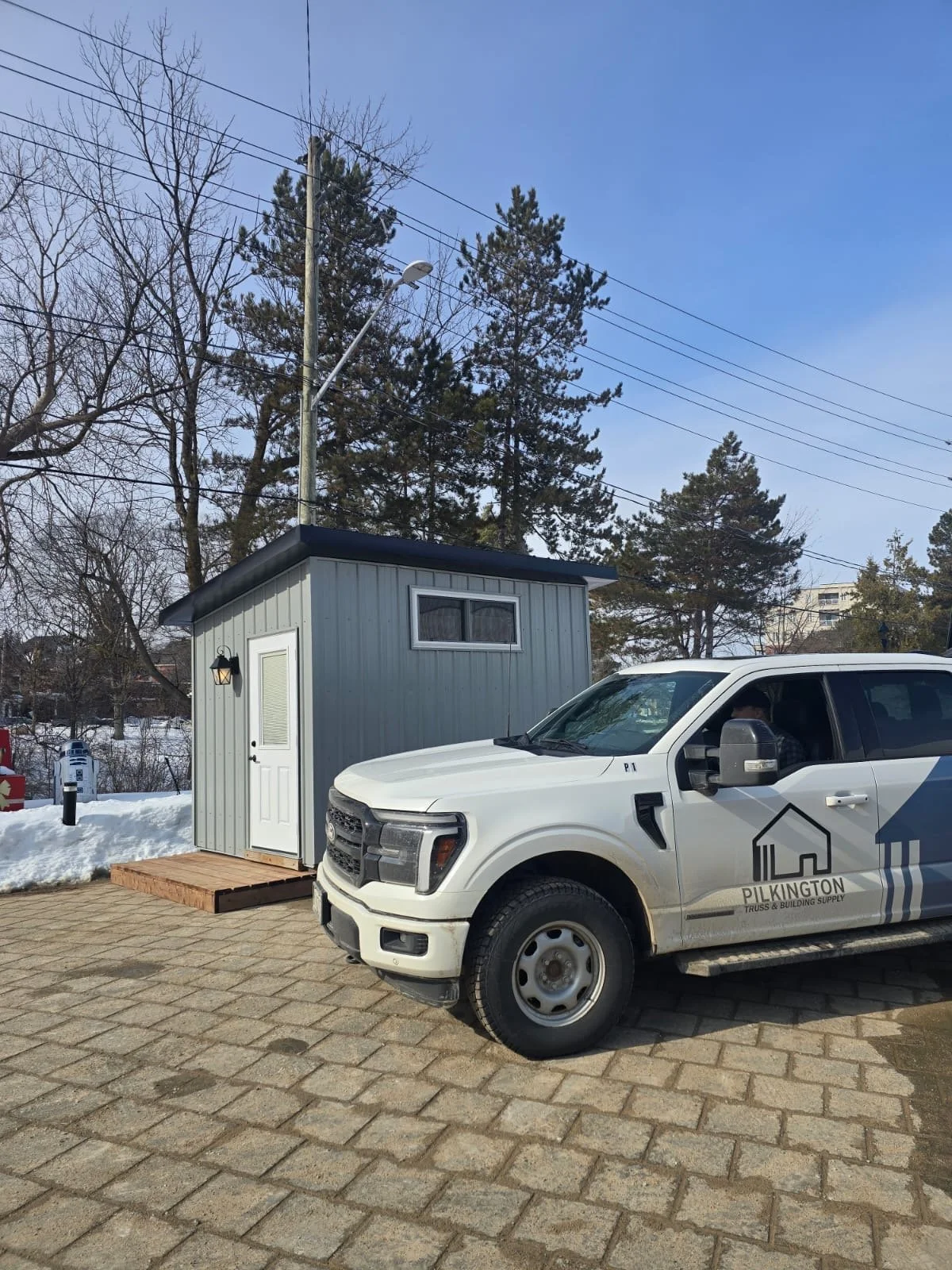 Truck wrap and pop up tiny home