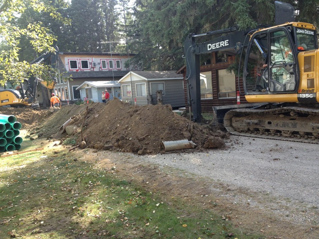 Streets being dug up for the installation of water lines for running water to the cabins, around 2010.