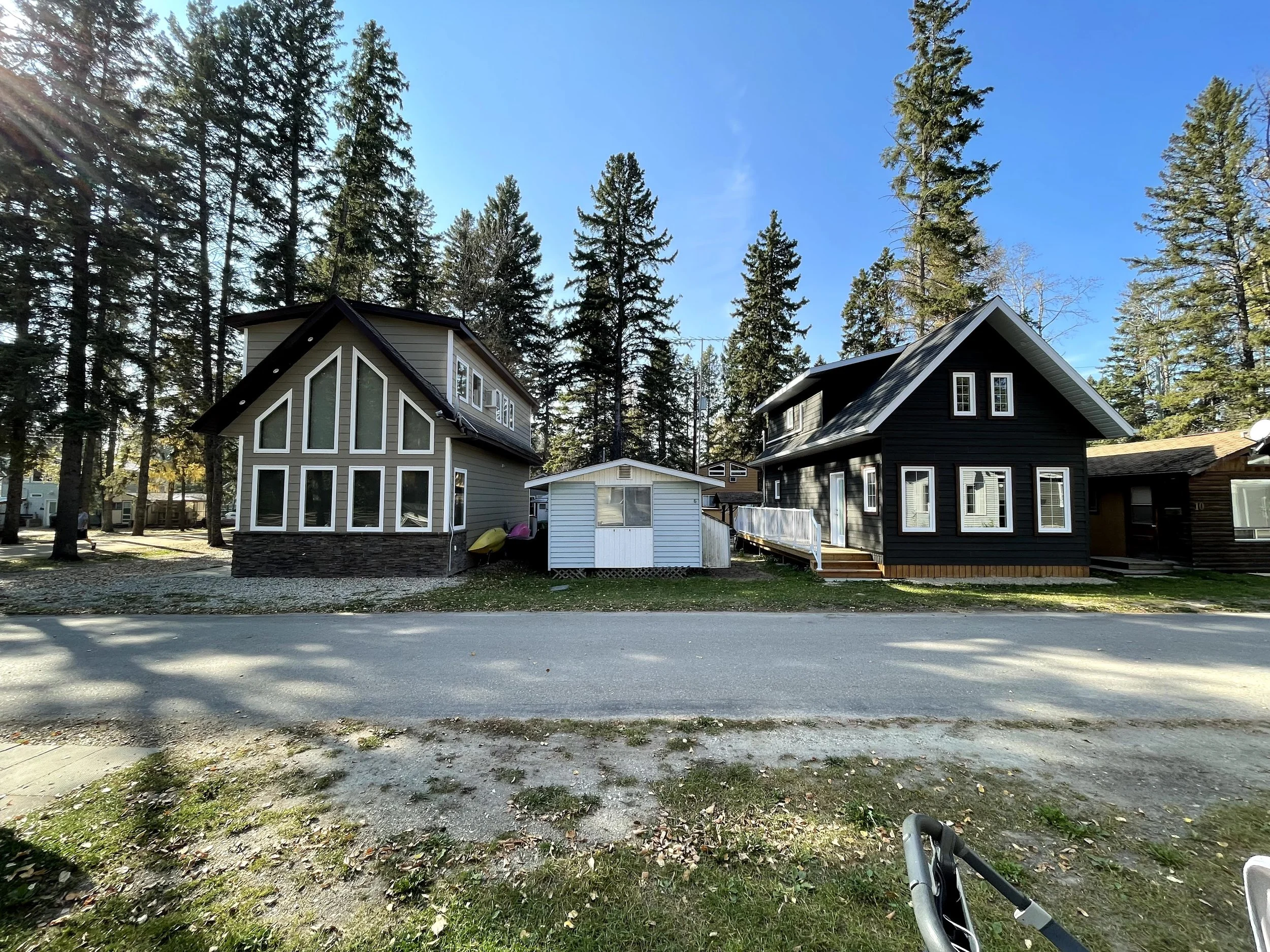 Old cabins between newer, updated models.