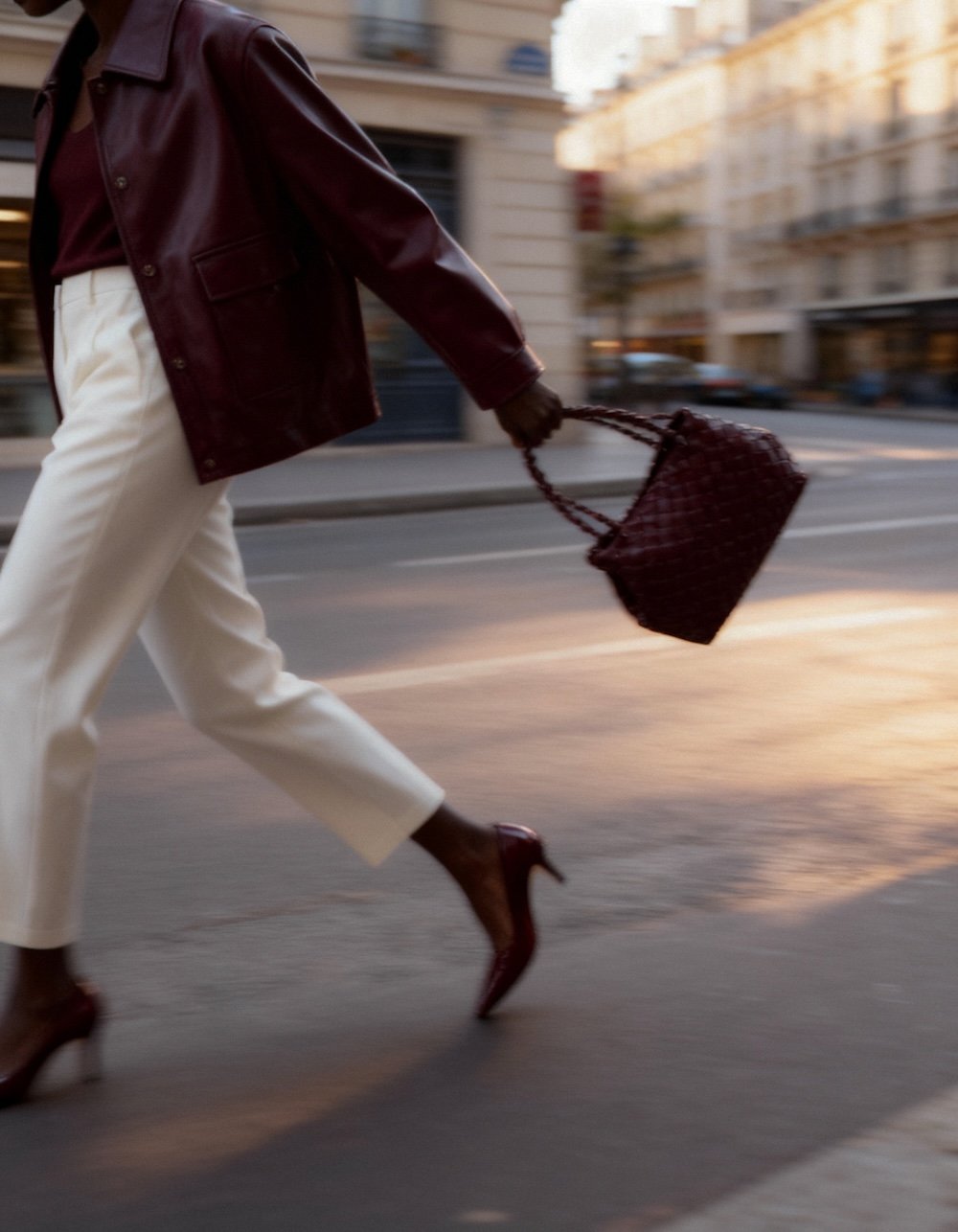 woman walking with purse in hand
