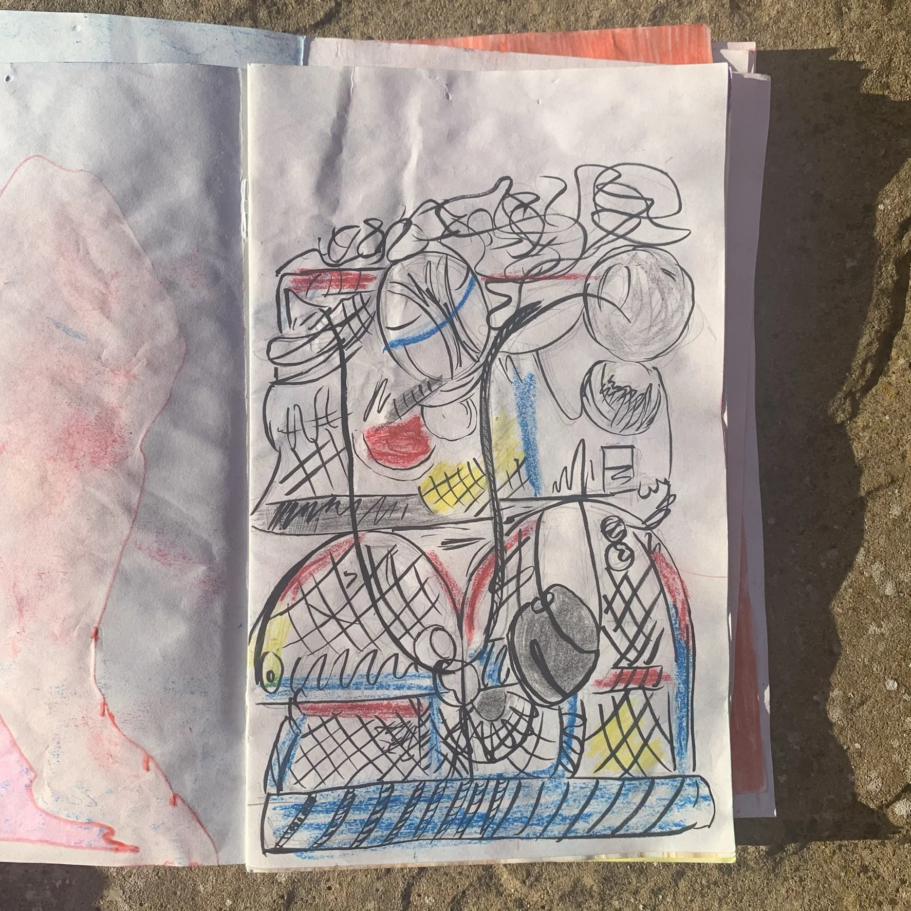 A colorful drawing of stacked lobster pots in black pen. With red, yellow and blue pencil details.