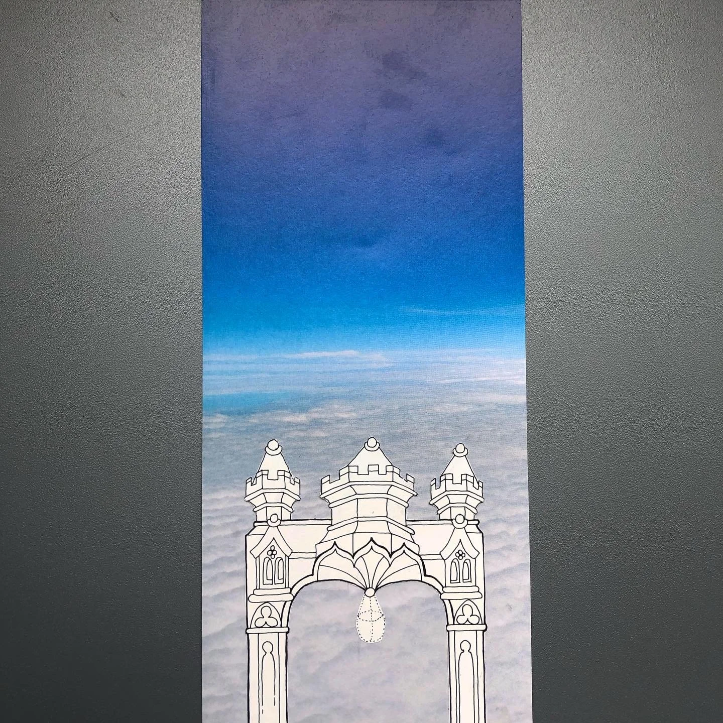 Drawing of an ornate archway with towers, set against a backdrop of a cloudy sky with blue hues.