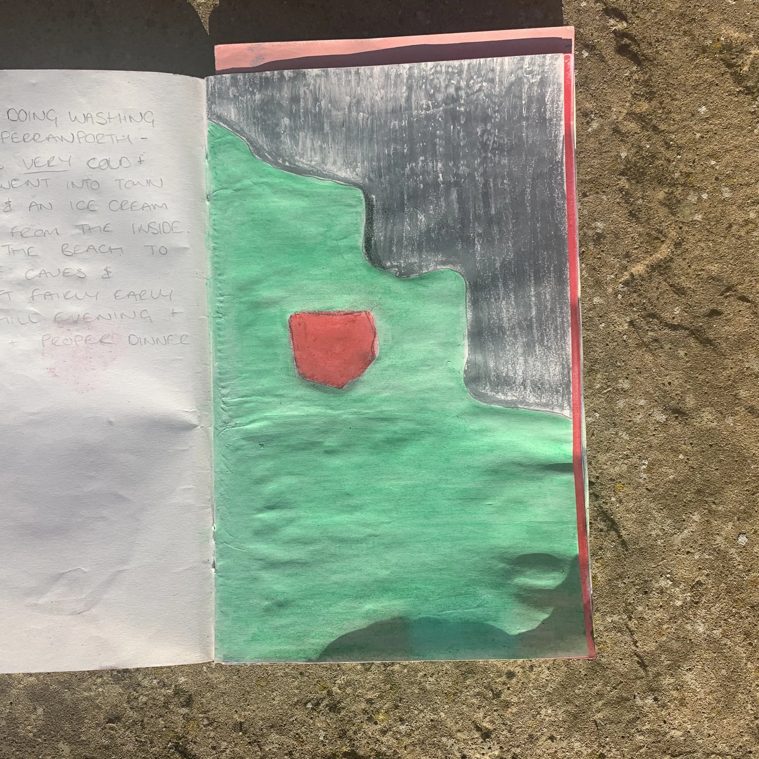 A colorful drawing of a coastal landscape with green grass, a red rock formation, and dark gray cliffs or mountains in the background. Handwritten text is partially visible on the left side of the image.