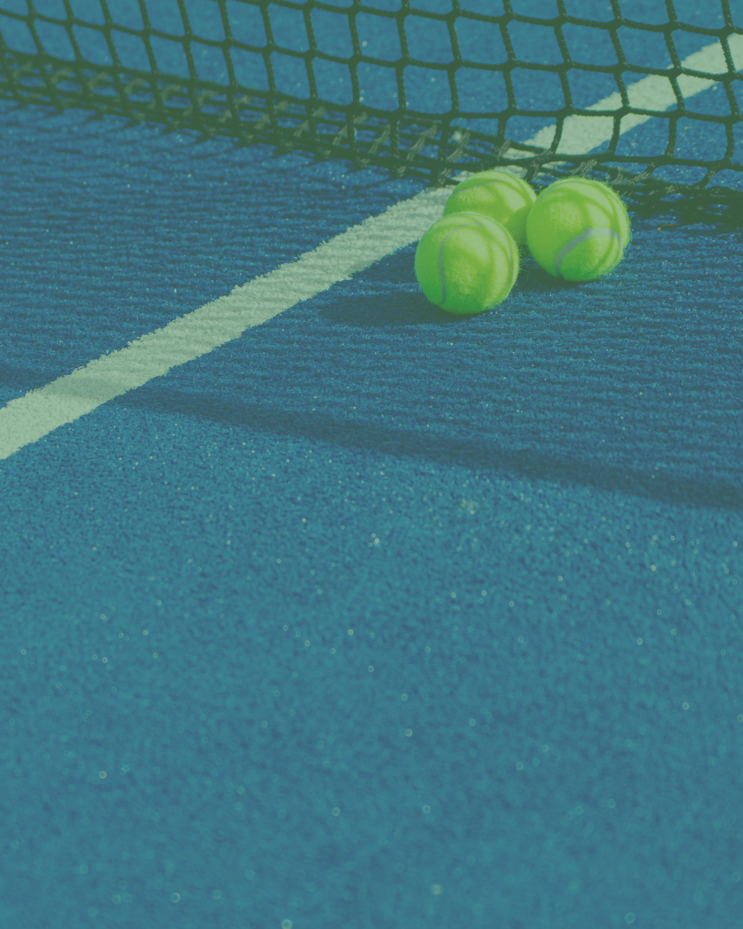Three bright green padel balls resting on a blue-turf padel court near the net.