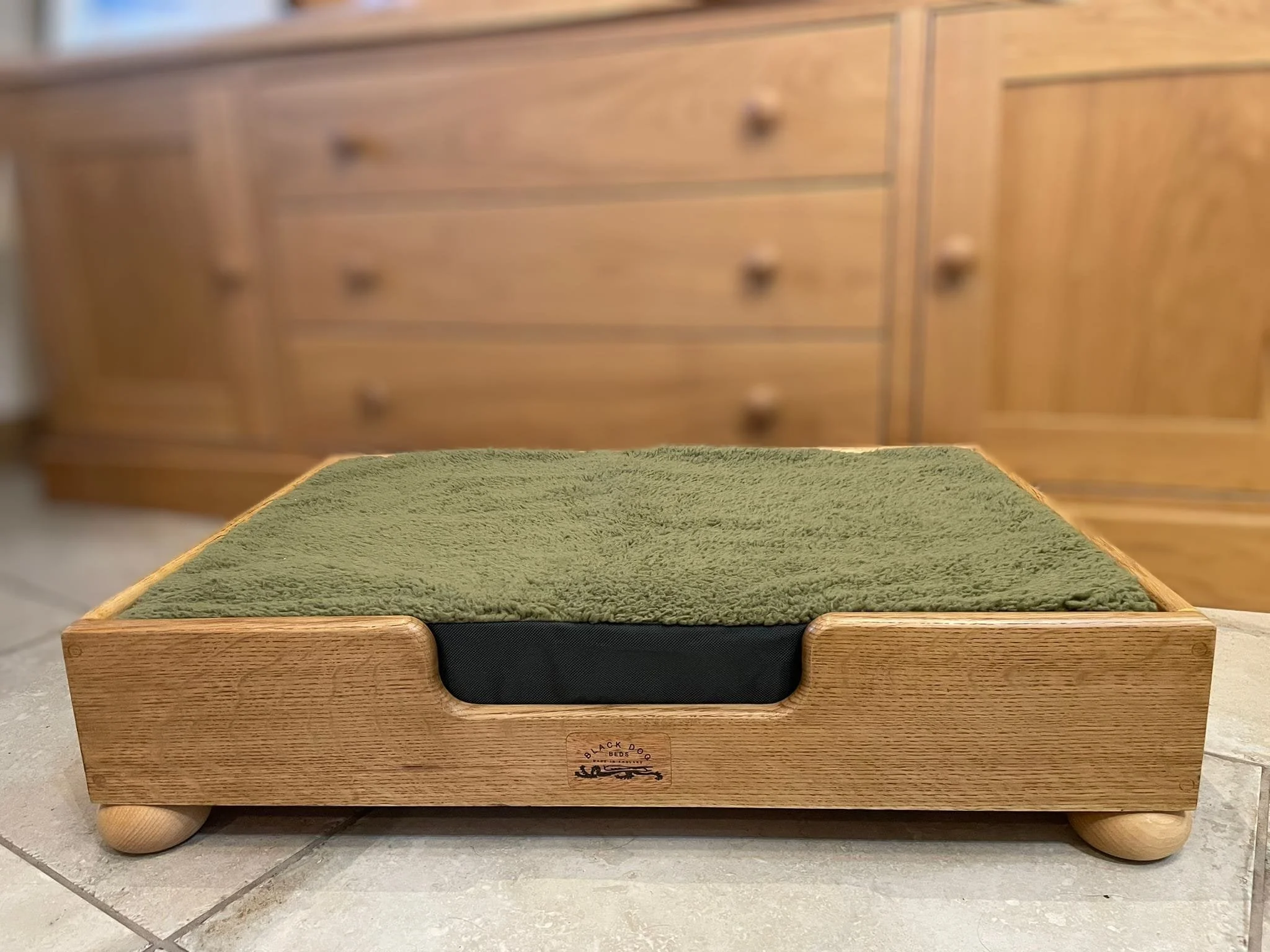 "Earl" oak frame finished in light.