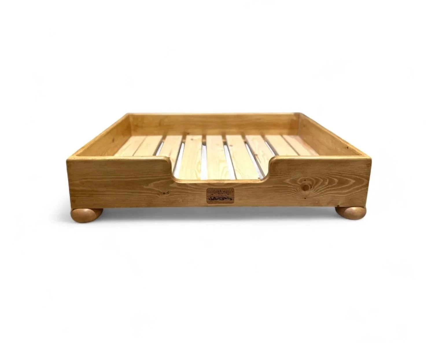 Wooden bed frame with rounded corners and slats, isolated on white background.