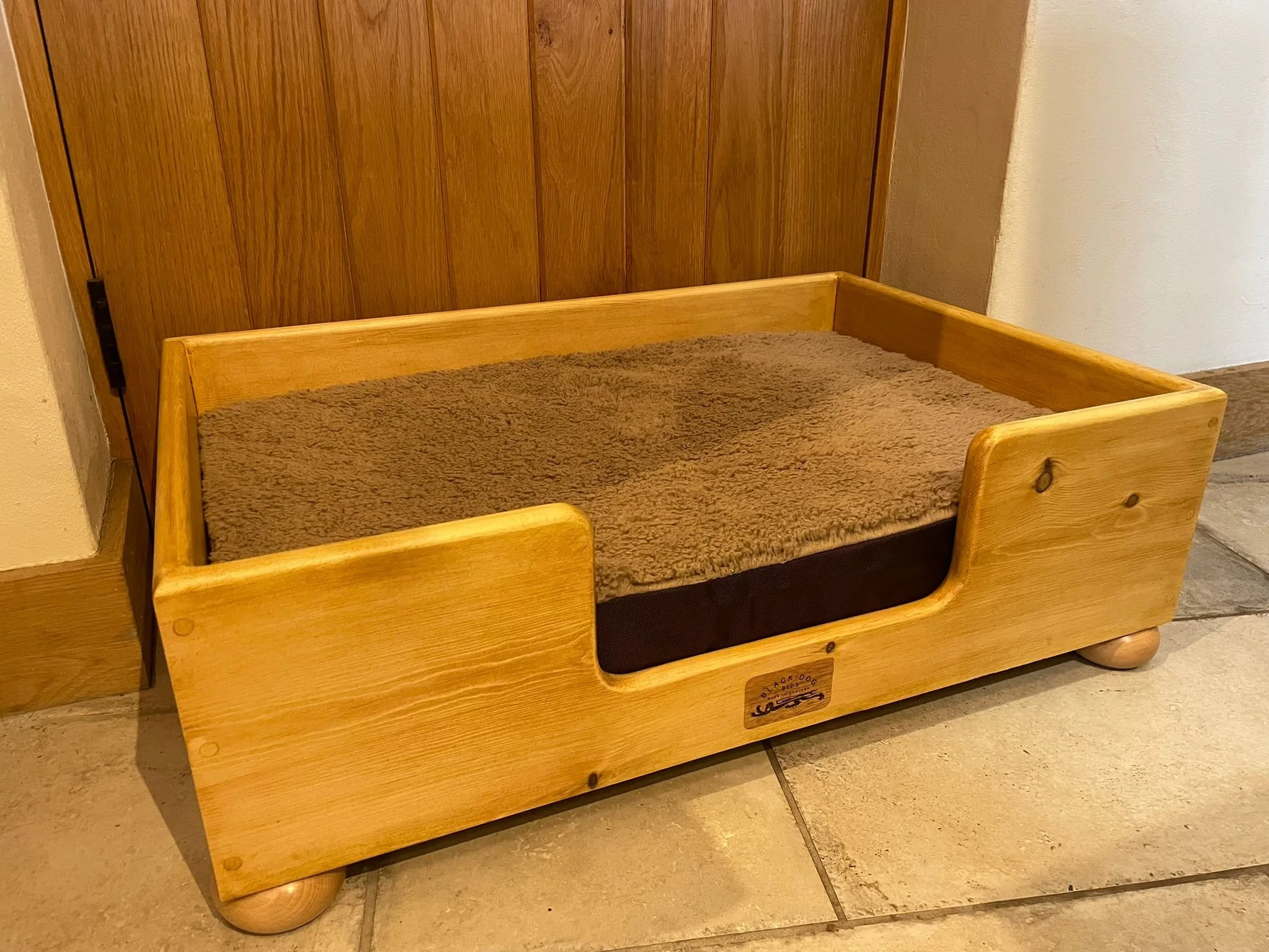 "Barren" pine frame finished in light.