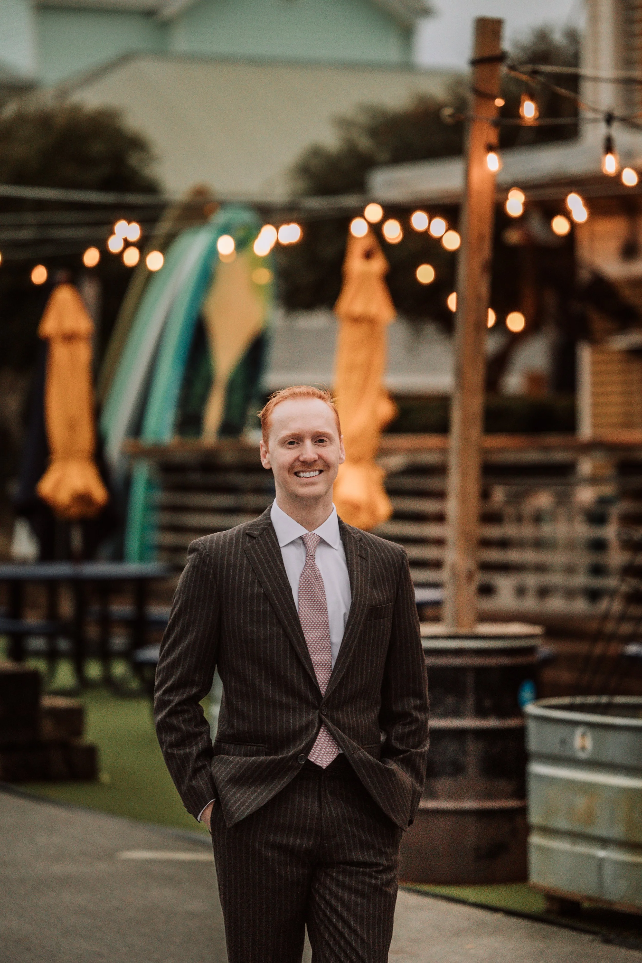 Attorney Blake Bohlman standing outside his Santa Rosa Beach law office.