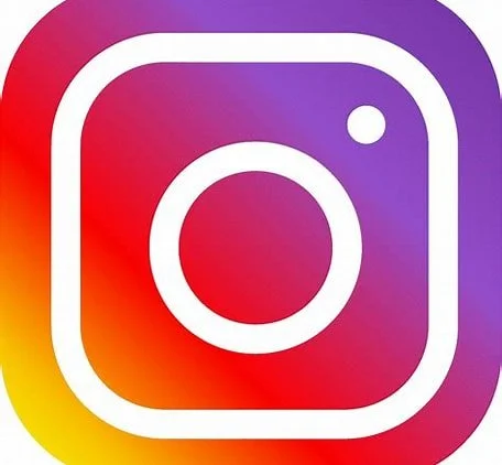 Instagram logo with a white camera icon on a colorful gradient background
