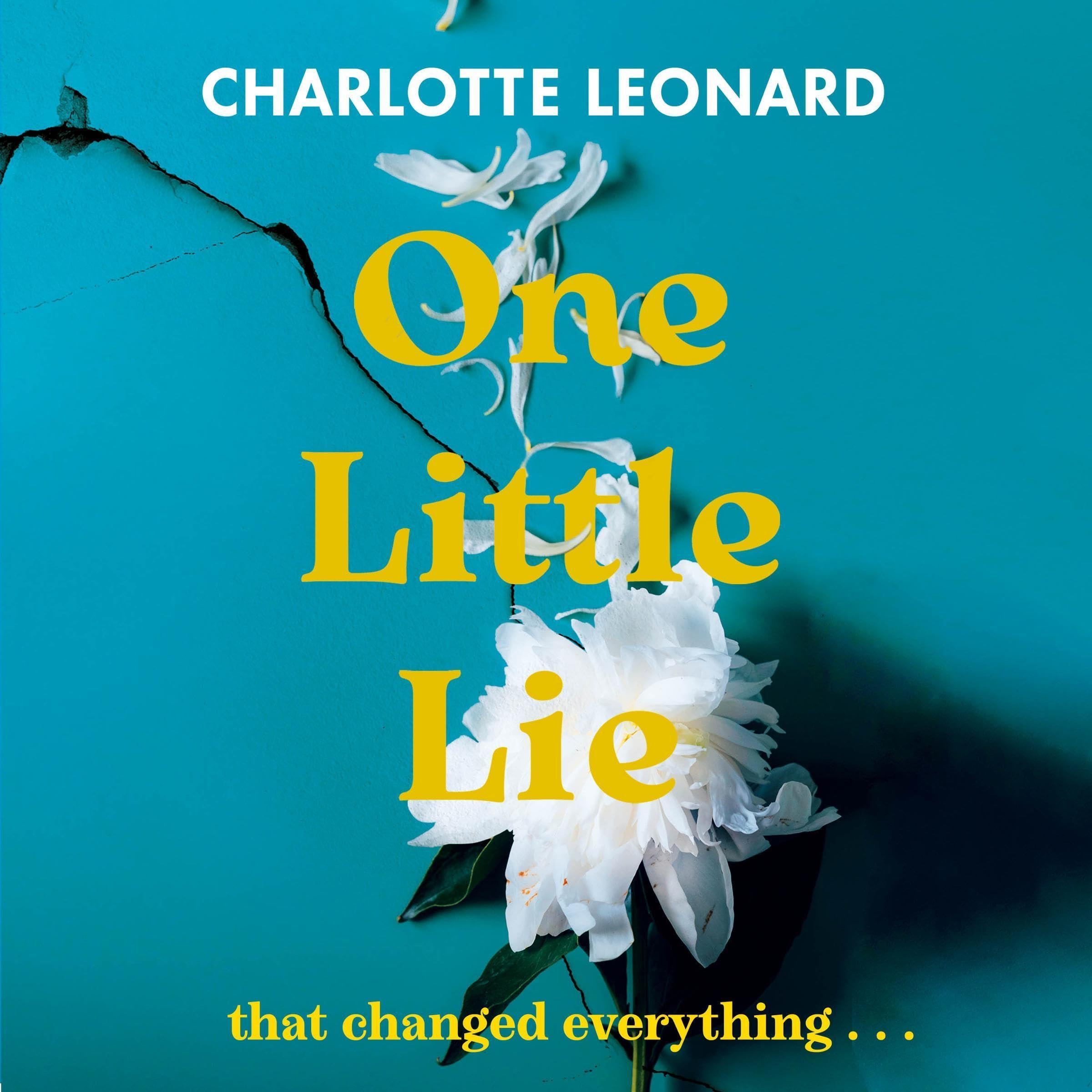 A torn piece of blue paper with white petals and green leaves of a flower attached, and yellow and white text reading 'Charlotte Leonard One Little' and 'that changed everything...'