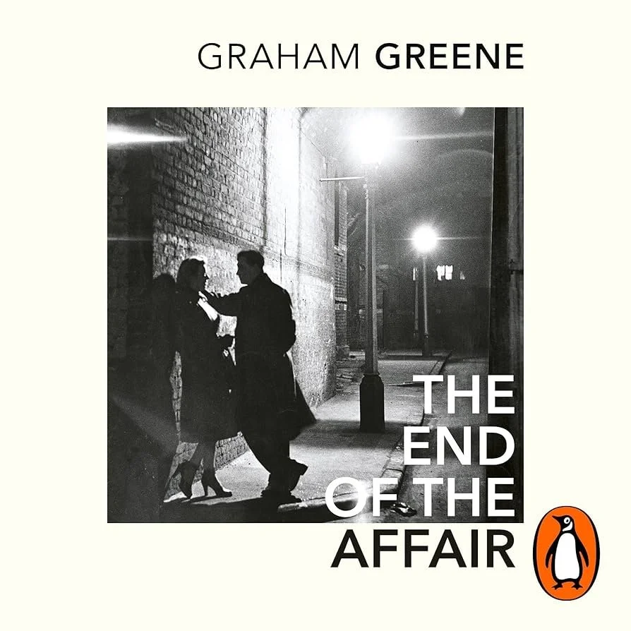 Book cover for Graham Greene's 'The End of the Affair' featuring a black-and-white photo of three people talking on a city street at night, with streetlights illuminating the scene, and Penguin logo in the bottom right corner.