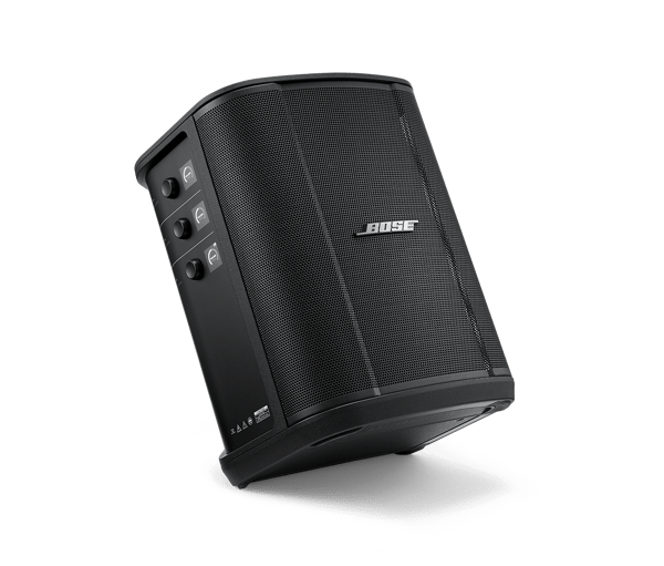 Bose Lautsprecher mit Lautstärkereglern und Anschlüssen auf der Seite.