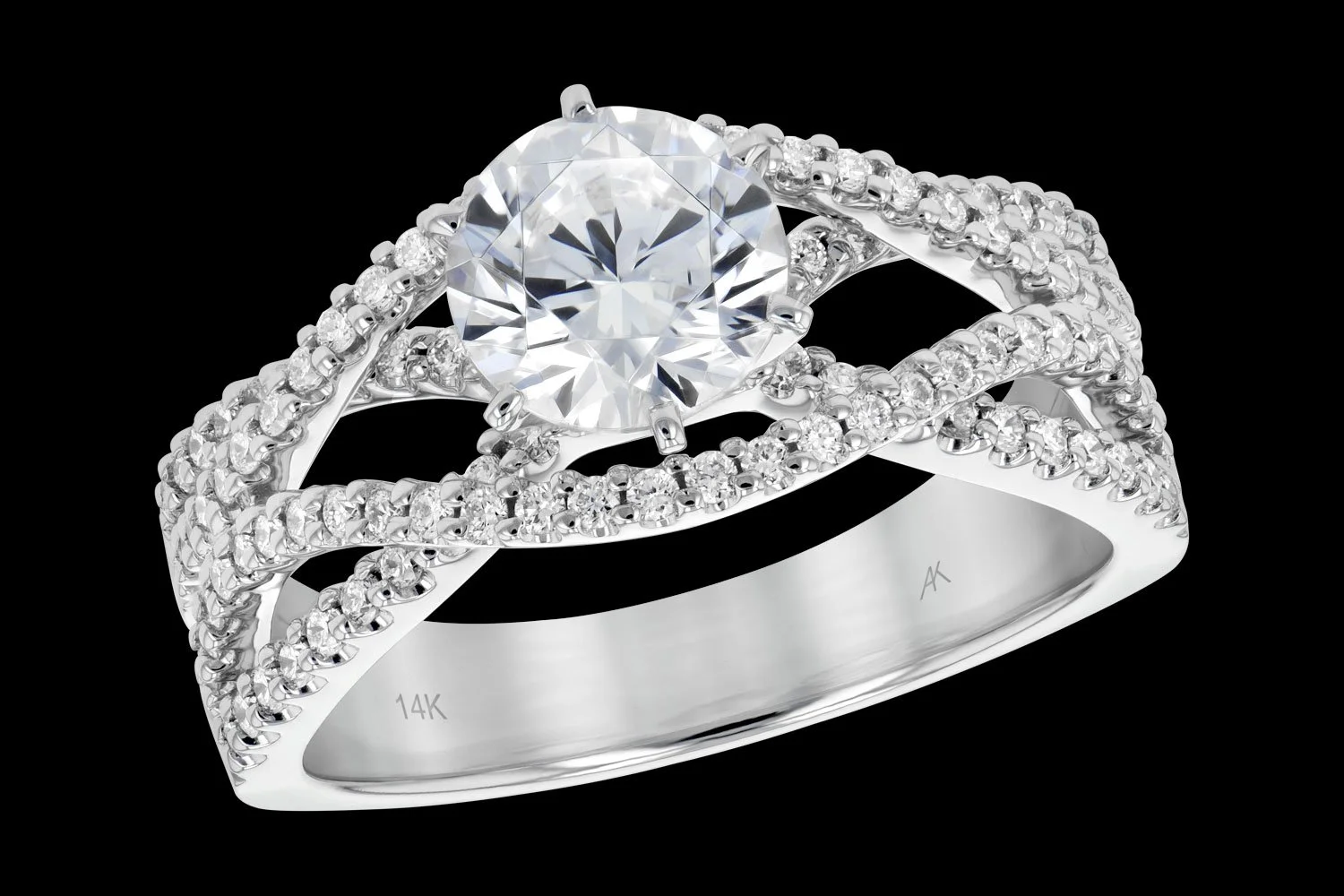 Diamond engagement ring in 14K white gold with a large round diamond center stone and smaller diamonds along the band.