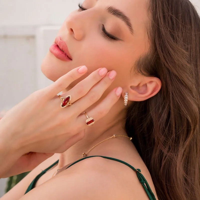 Ruby fashion rings and diamond earrings