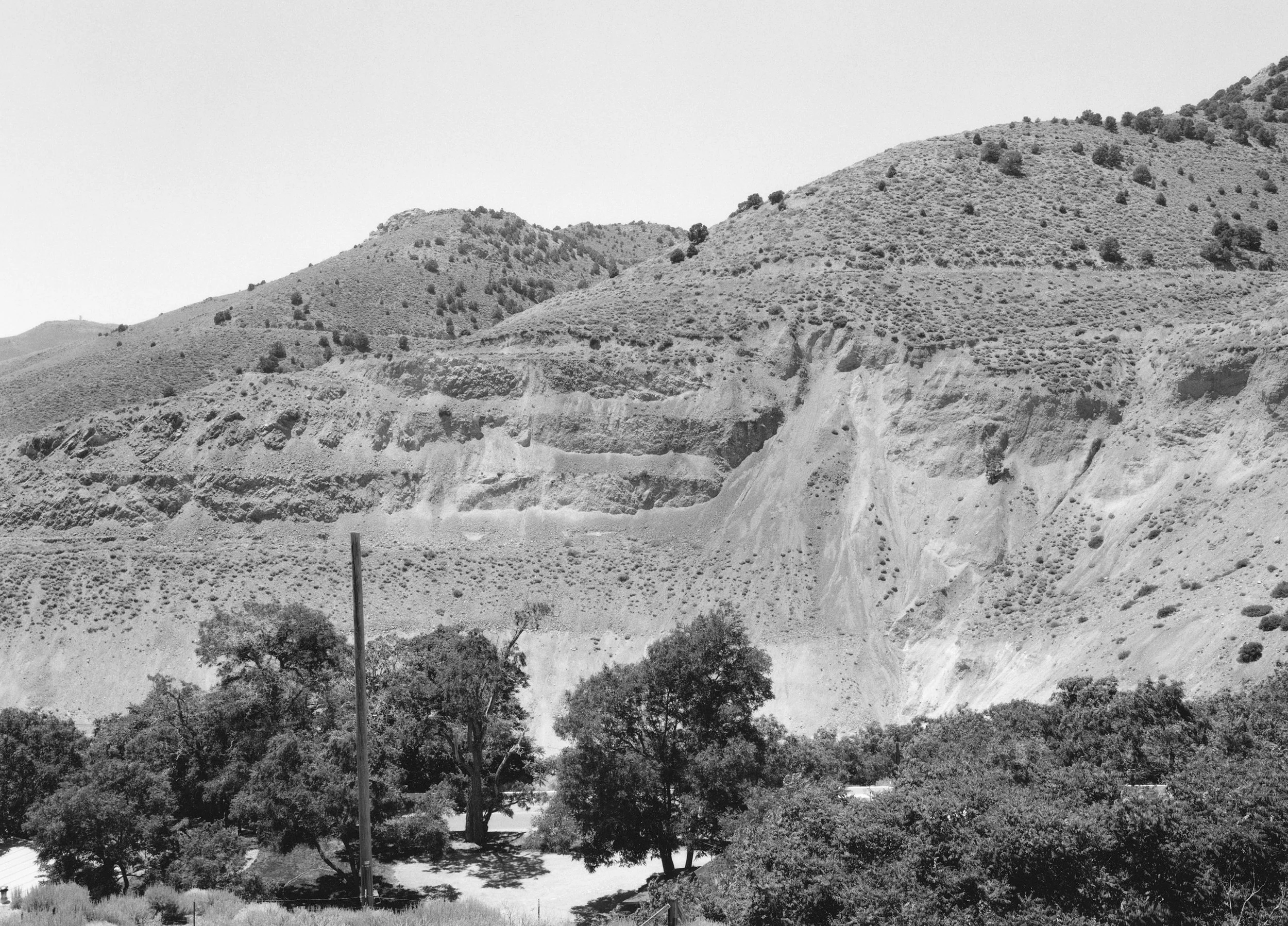Mark Klett and Byron Wolfe for the Third View Project, 1998. Abandoned strip mine at the site of Comstock Mines, Virginia City, NV.