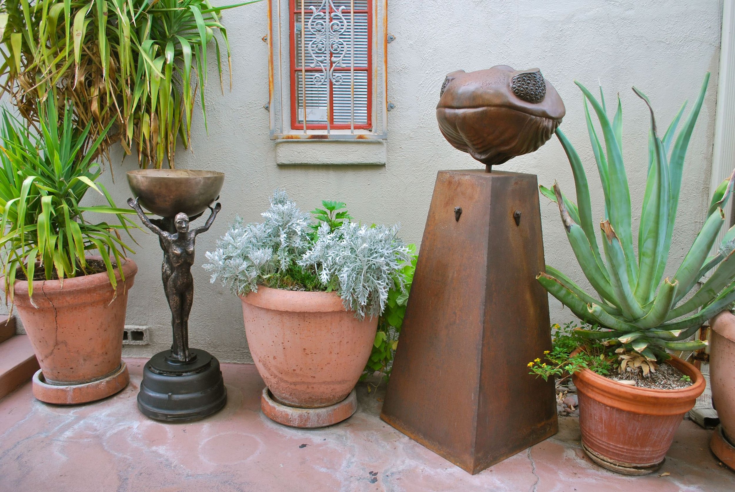 trilobite and chalice in garden.jpg