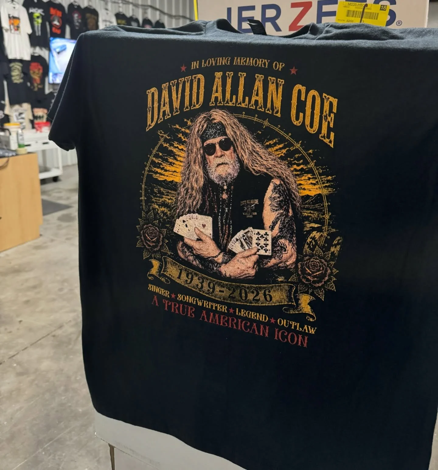 Yesterday was a wild one. Kim Coe, widow of the late great David Allan Coe hired us to print memorial shirts for his service Friday. We got the approval at 6pm Tuesday. Wednesday we ordered and picked up blanks, setup artwork, made 8 screens, printed