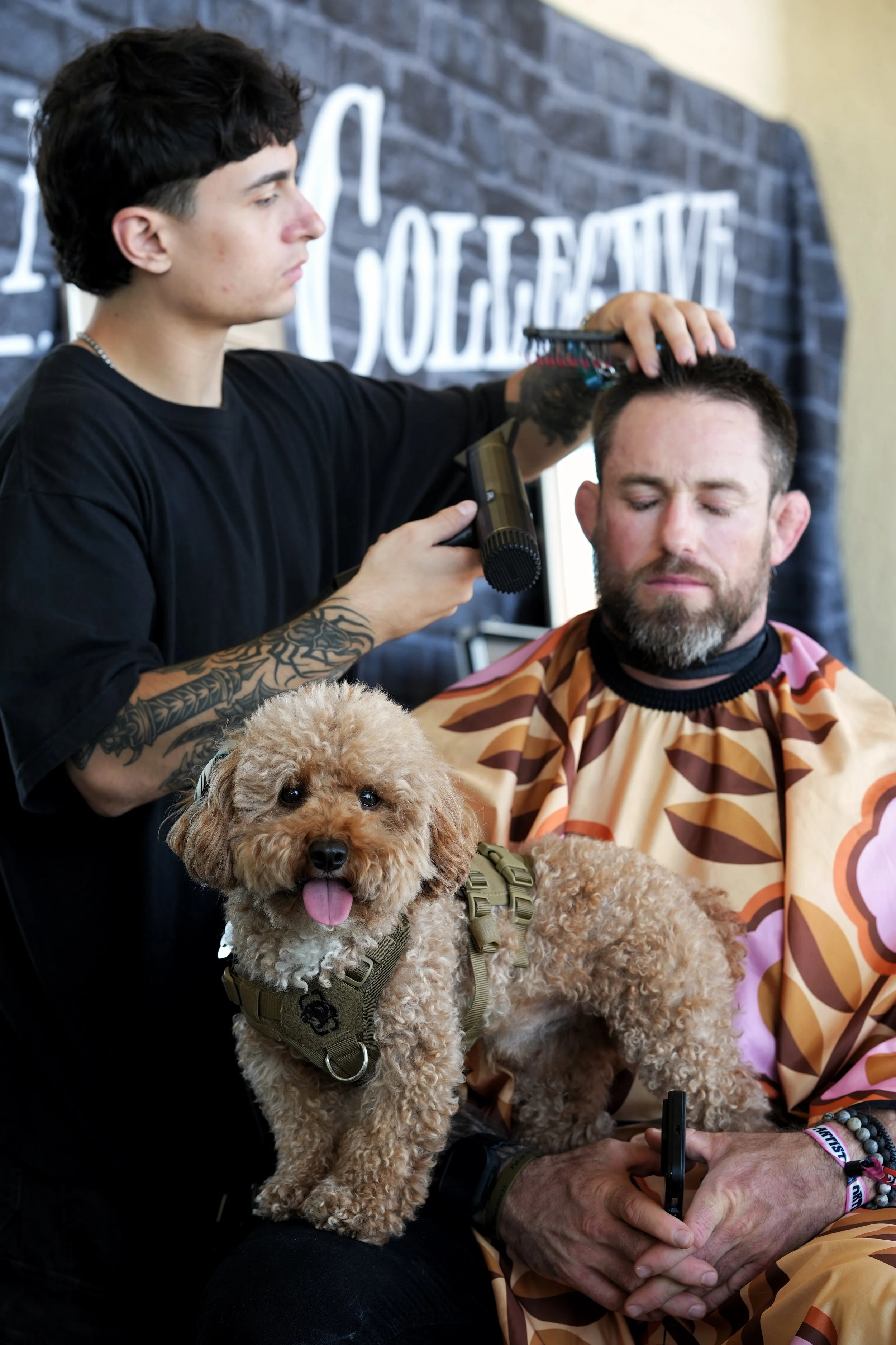 Bradley Beach barber with a dog