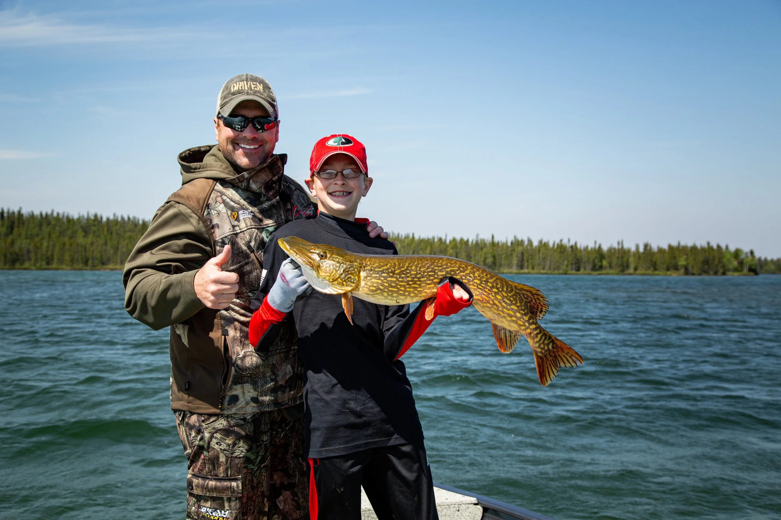 Pat and Cole Cree Lake.jpg
