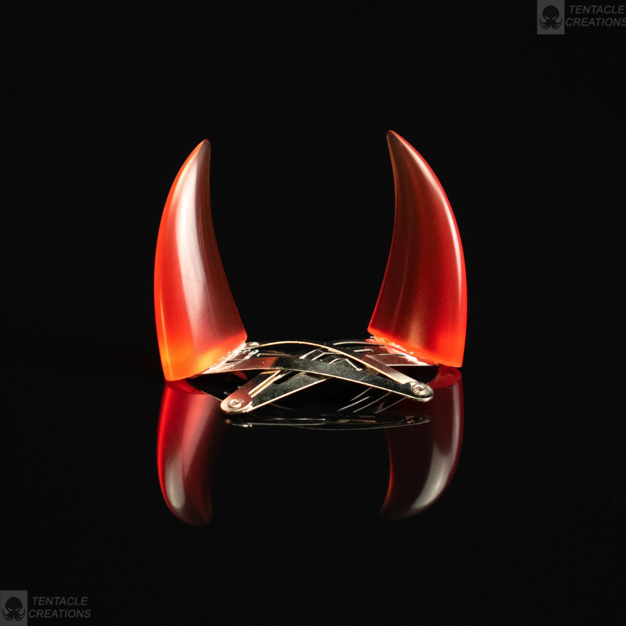 Horn hairclips - transparent orange