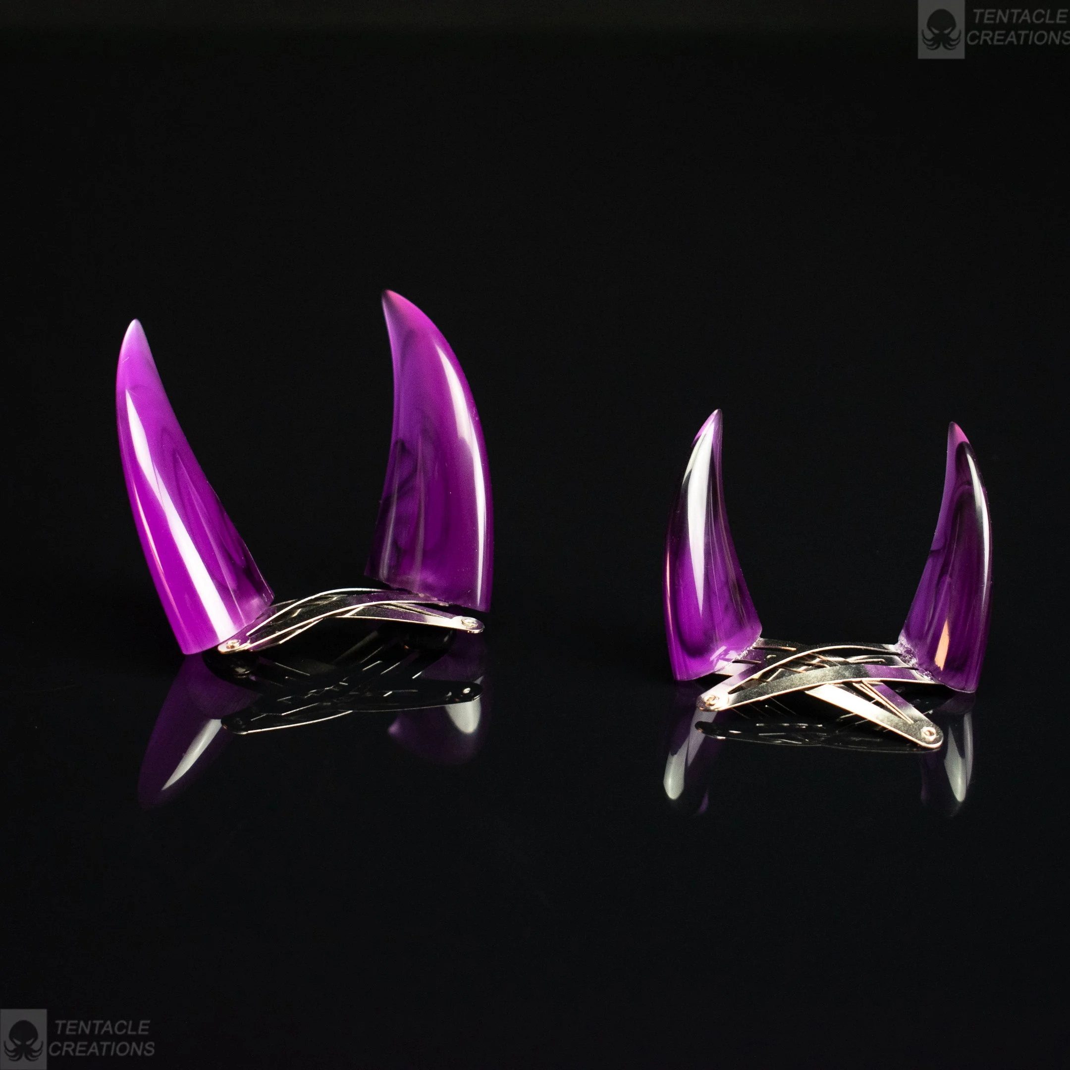 Horn hairclips - transparent purple with black swirls