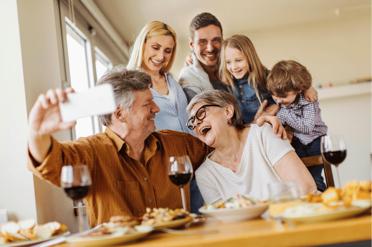 a healthy multigenerational family enjoys a meal together