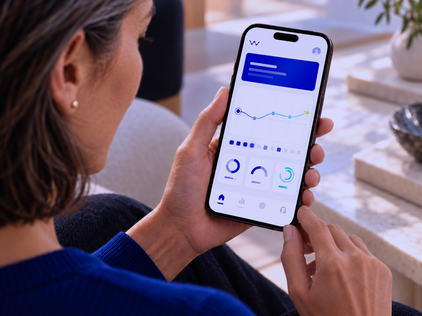 Woman viewing personal cognitive wellness trends in the Wavium app.