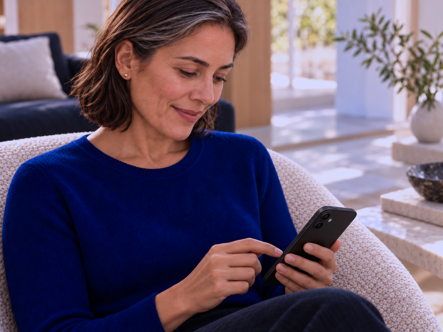 Woman reviewing cognitive wellness guidance in the Wavium app.