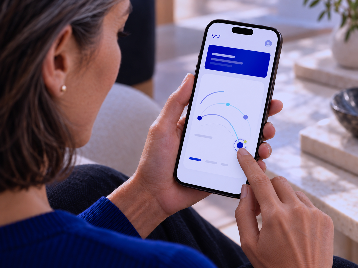 Woman using the Wavium app to complete cognitive wellness activities.