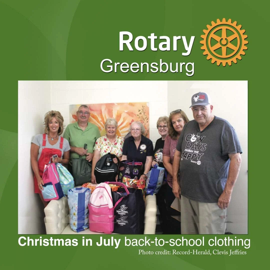 Greensburg Rotary members recently presented to Youth Services Center Coordinator Kelli Henderson, left, Back-to-School clothing and other items as part of the Christmas in July project benefiting 12 students served by the Center. Pictured from left,