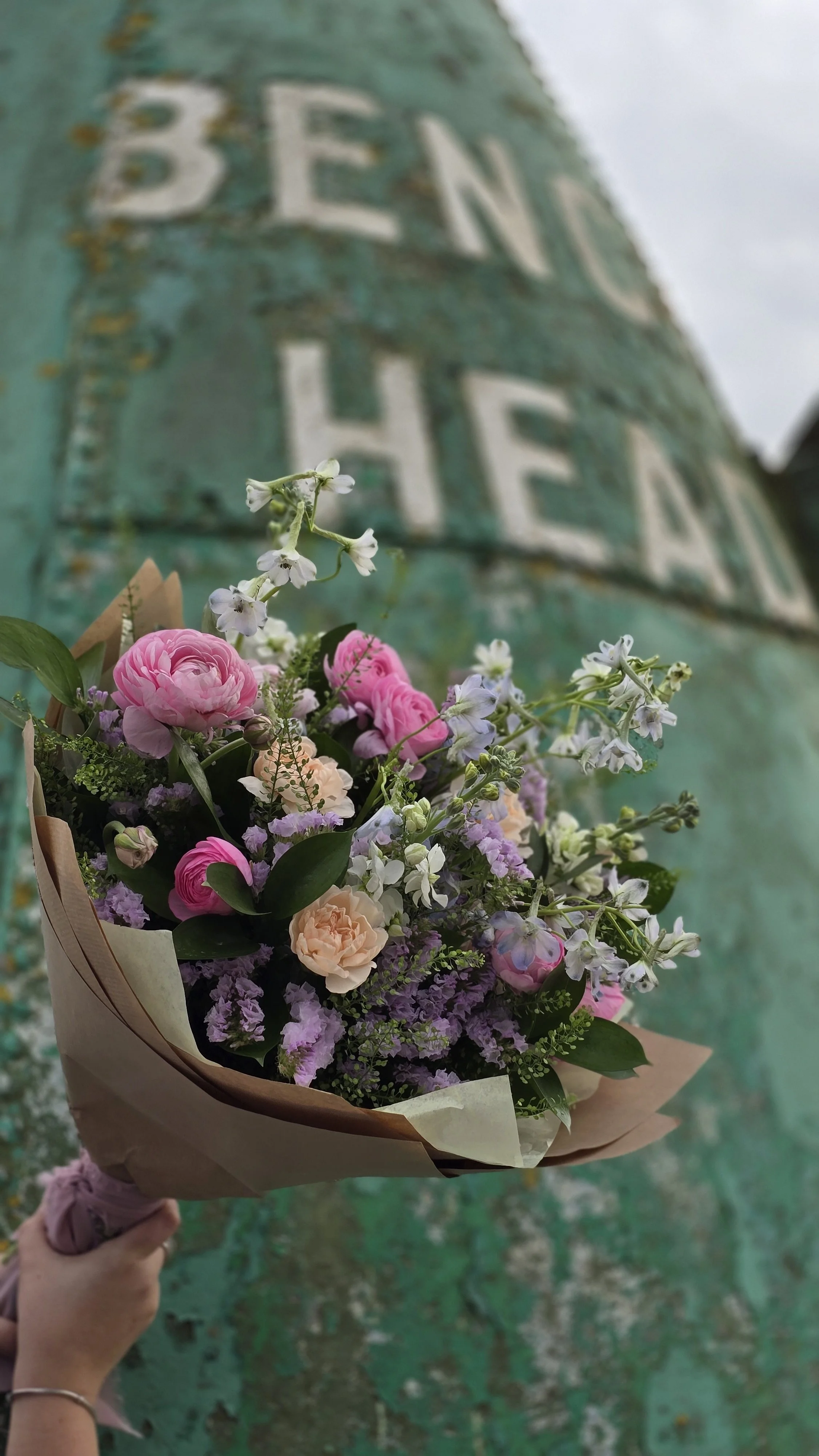 Bouquet of pastel flowers in Wild & Unruly signature garden-gathered style
