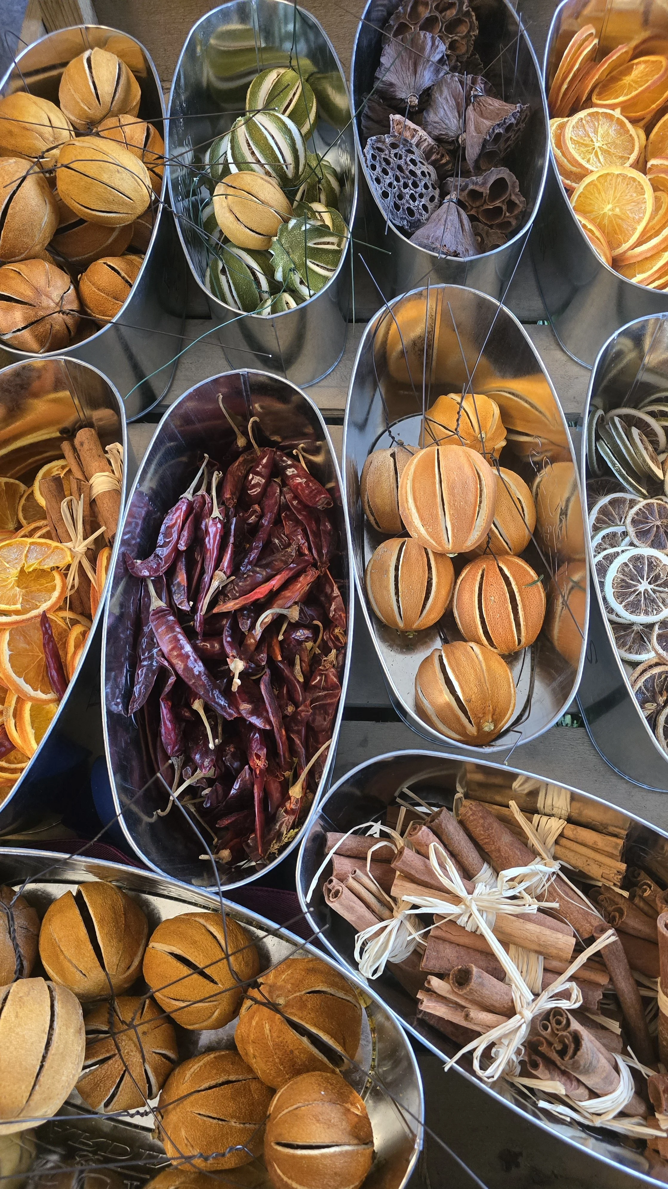 Christmas Wreath Bar showing decorations such as Dried Orange Slices, Cinnamon sticks and pinecones (Copy) (Copy)