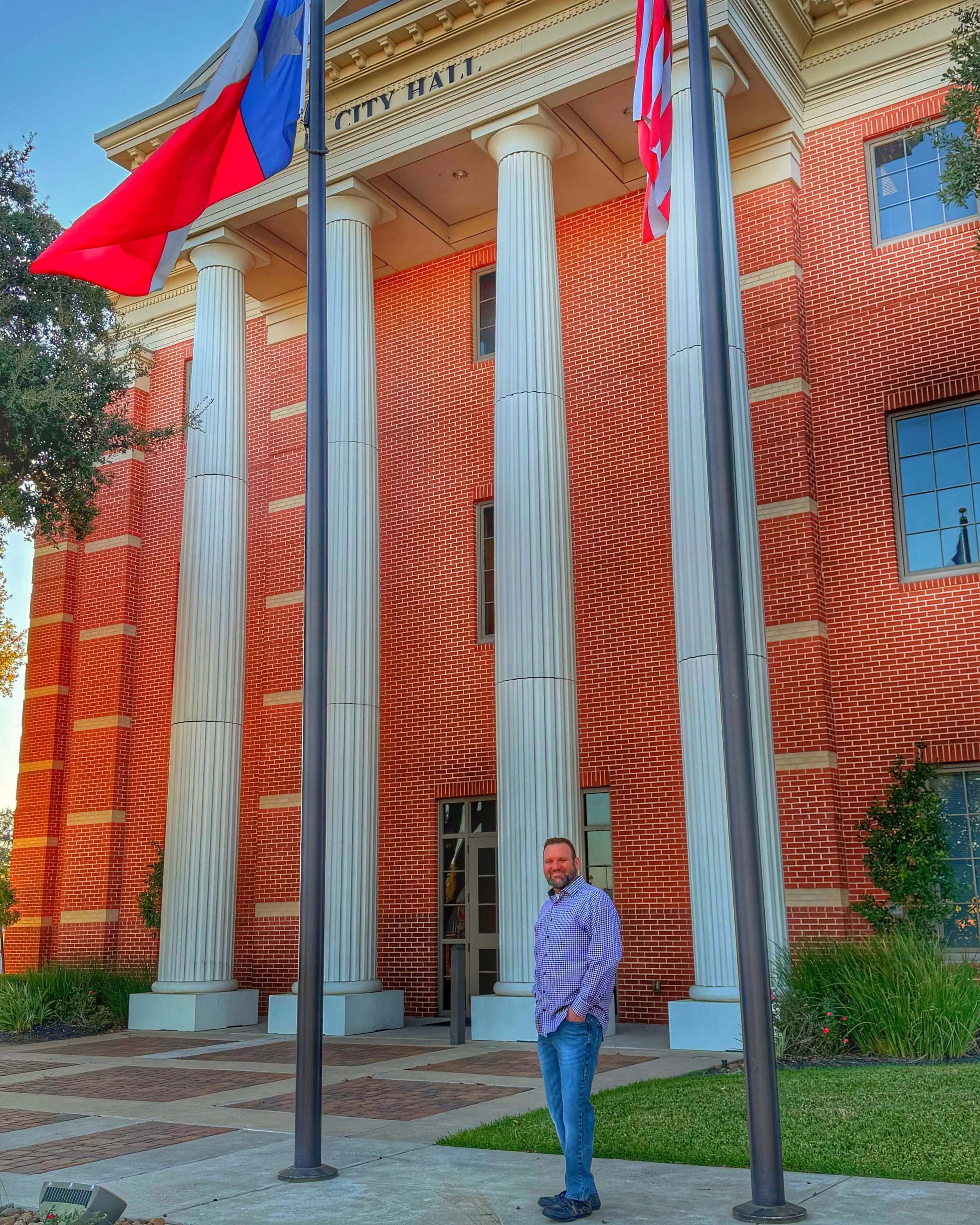 Michael Meihls stands outside Katy City Hall in Katy, Texas.