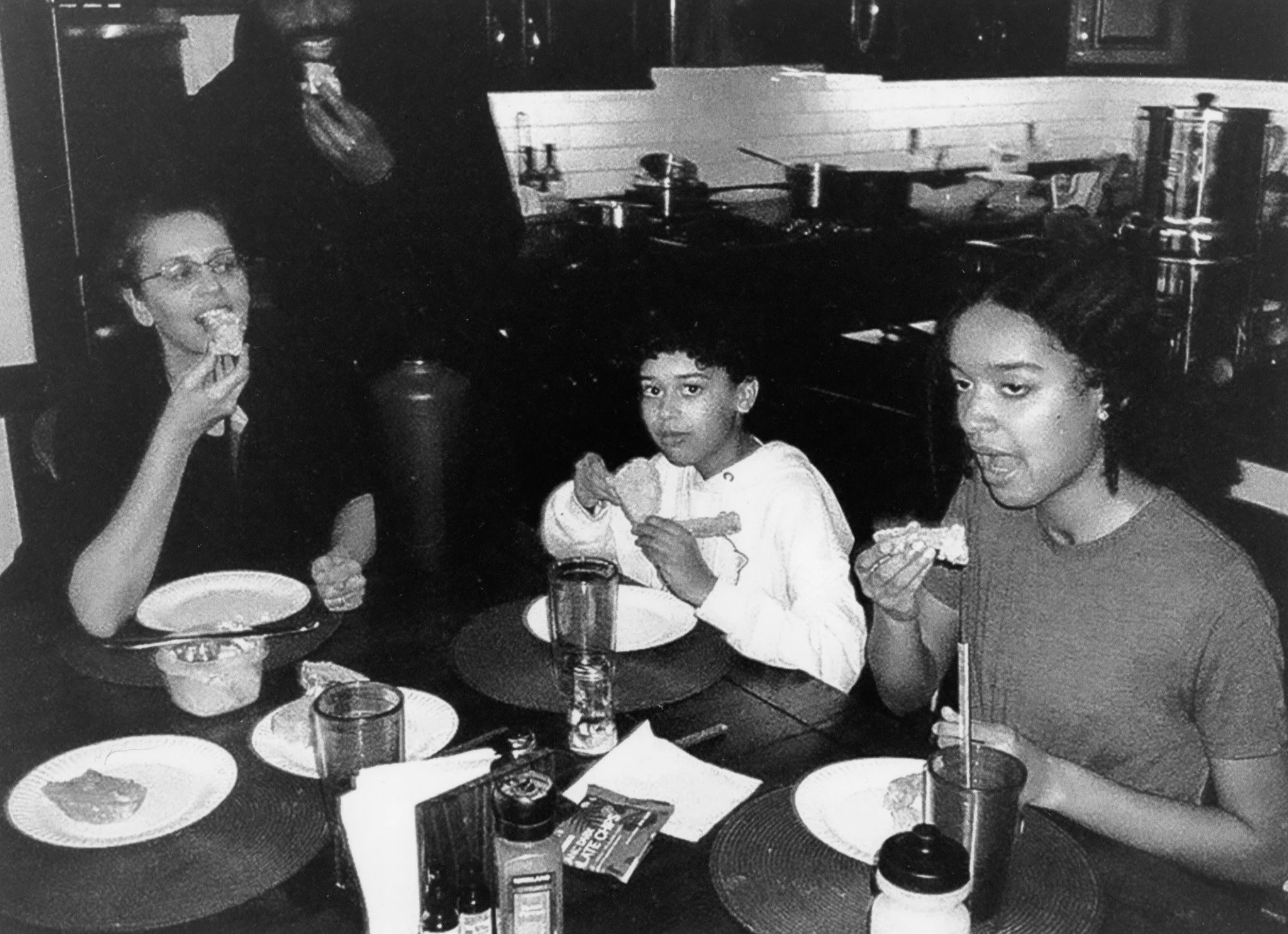 Family Eating Bread, 2025, 5x7in, Photography, Gelatin Silver Print