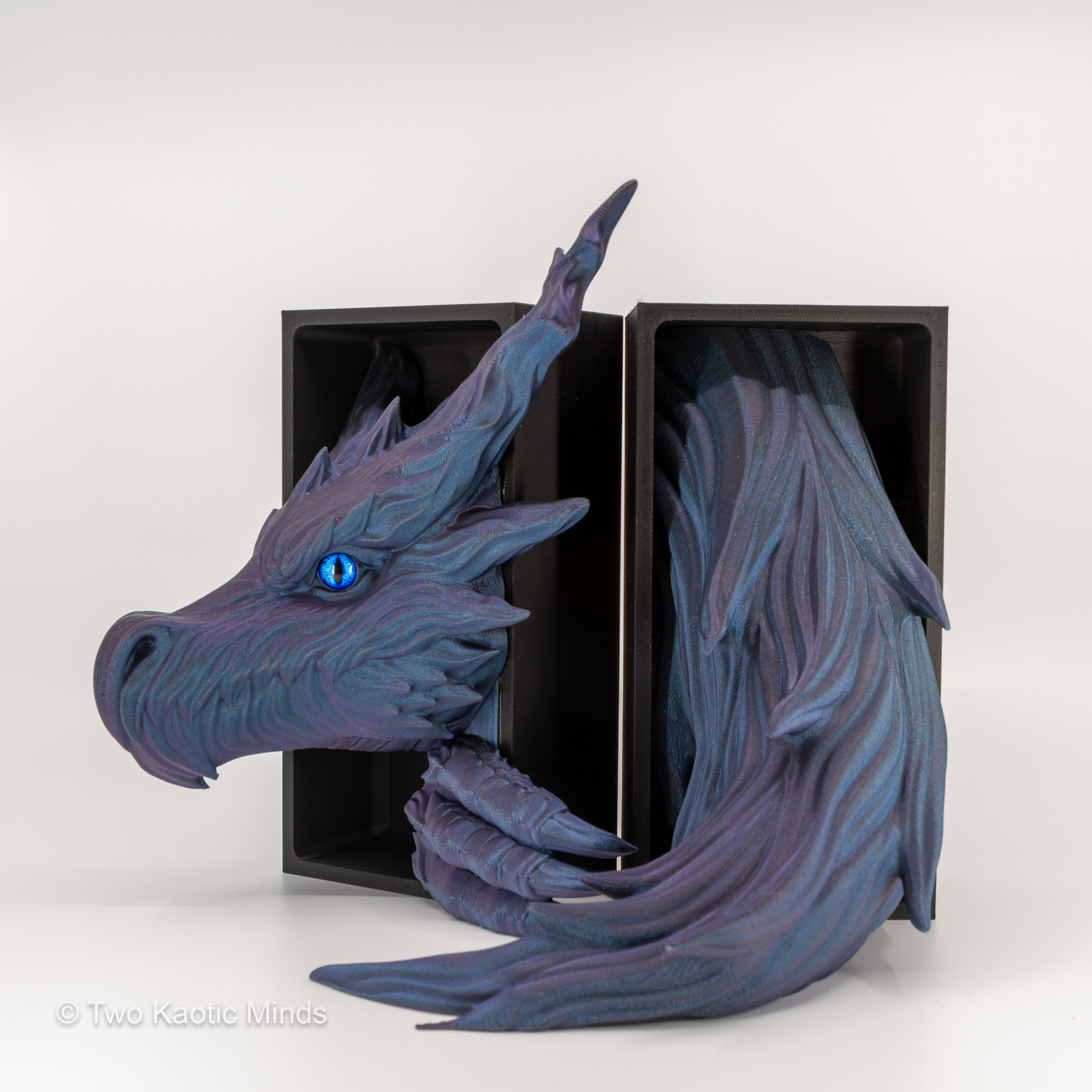 Shadow Dragon head and tail set shown together with matte black outer box, angled view showing full iridescent blue-purple Starlight Twilight detail