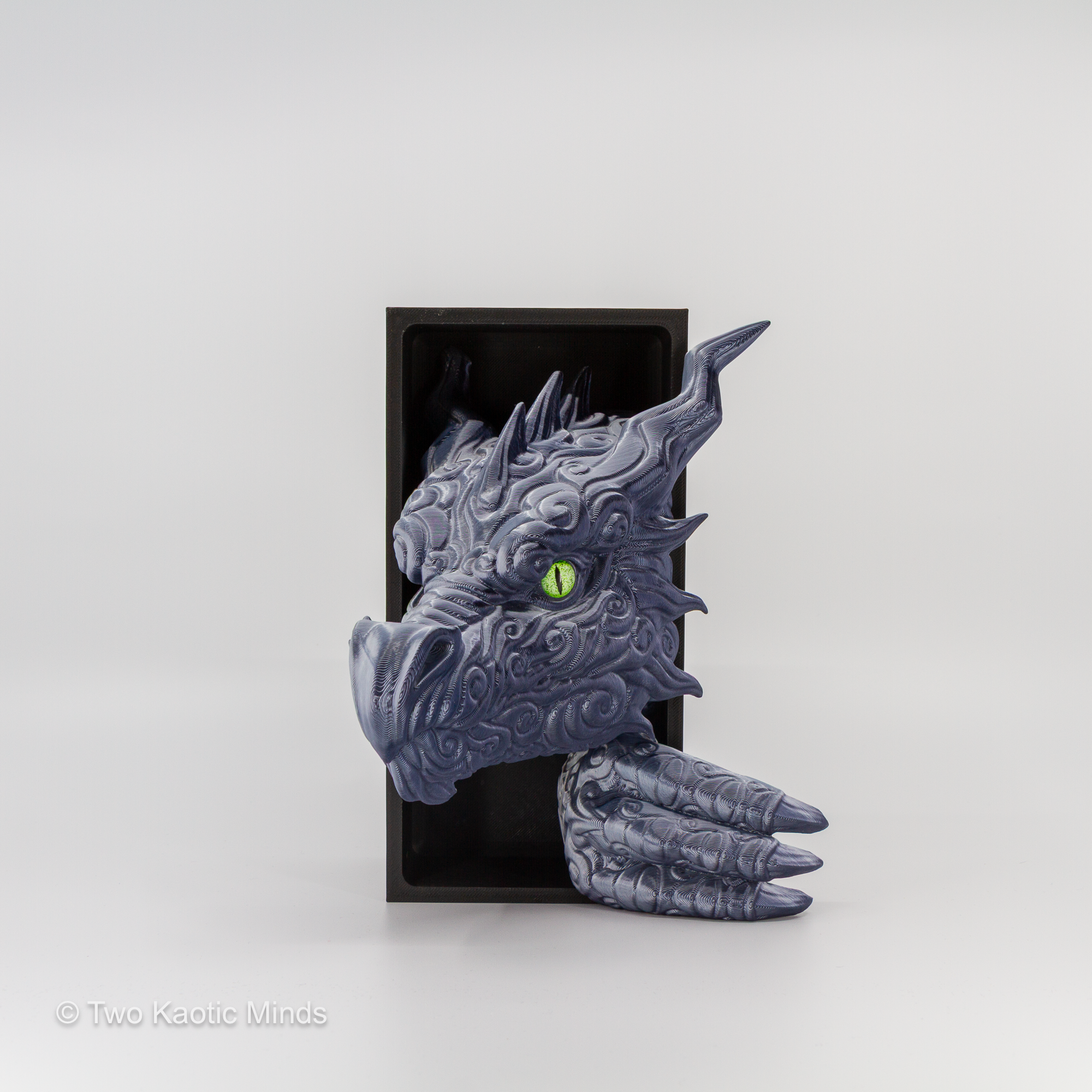 Opposite side angle of the granite Cloud Dragon book nook showing clawed hand detail and dragon head emerging from the black box