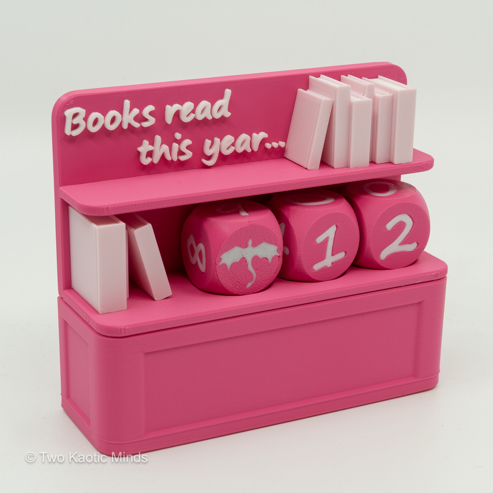 Pink Book Counter with pale pink mini books and dice showing numbers 1 and 2