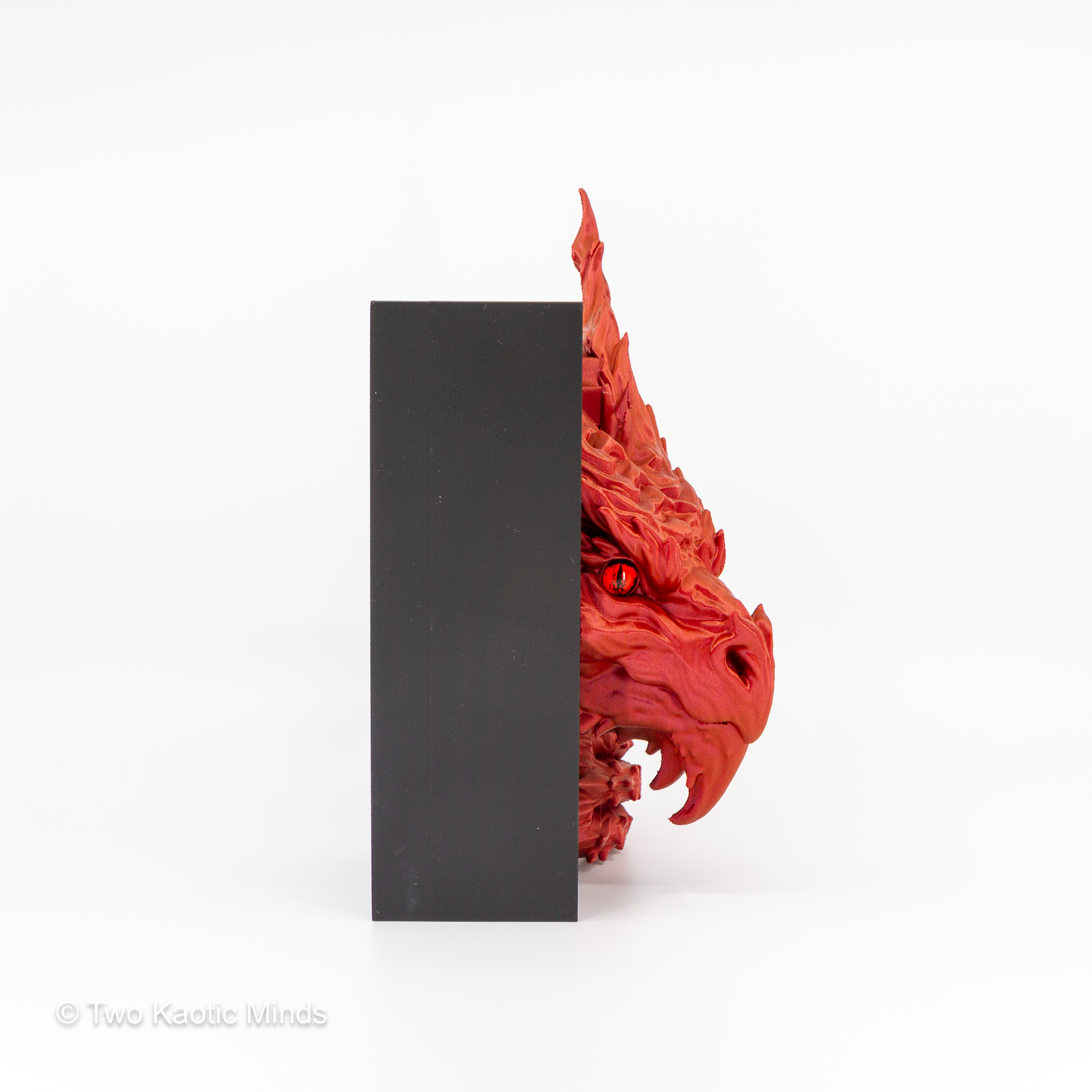 Side view of the Inferno Dragon book nook showing sparkle red dragon head profile against the matte black outer box