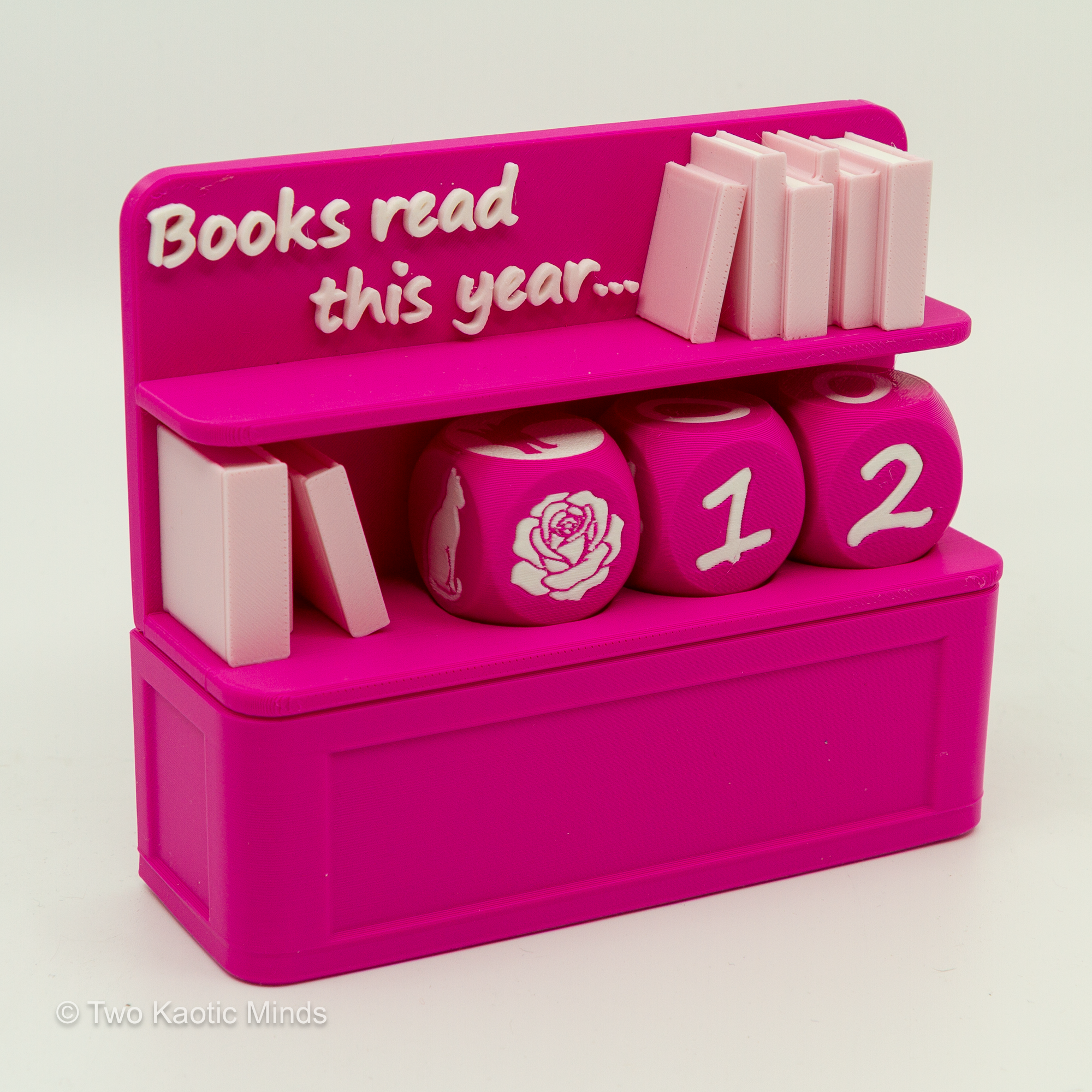 Magenta and pink color variant of the Book Counter with pink mini books and magenta dice showing a rose icon