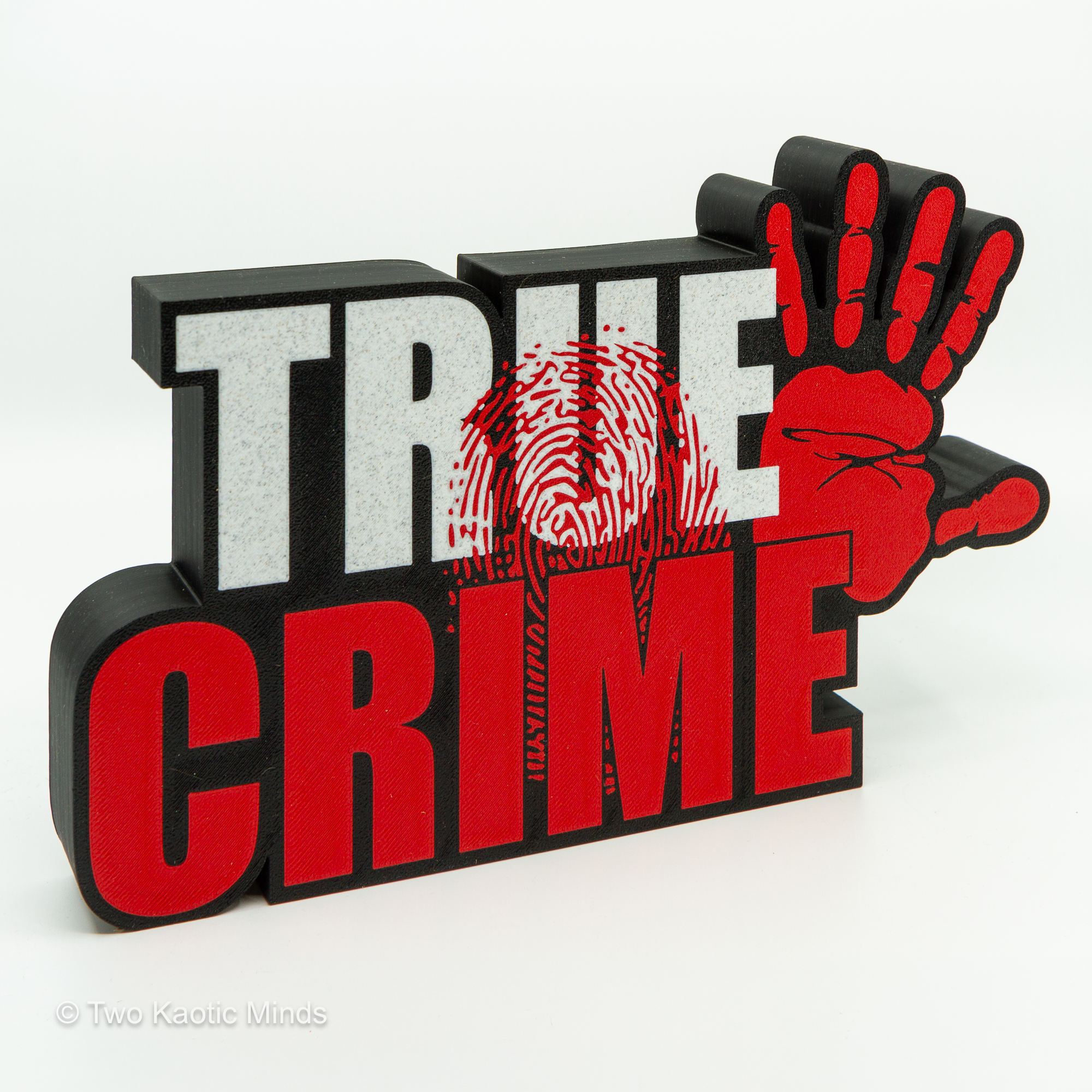 3D printed True Crime shelf sign in black, white, and red featuring bold stacked text, a fingerprint graphic overlay, and a red bloody handprint extending from the right side, angled view