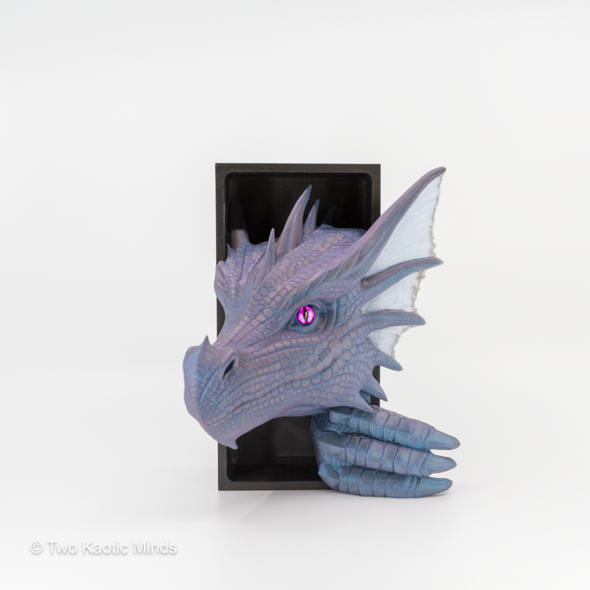 Angled front view of the Mercury-Ice Blue Sea Dragon book nook showing translucent ice blue fin detail and purple glass eye