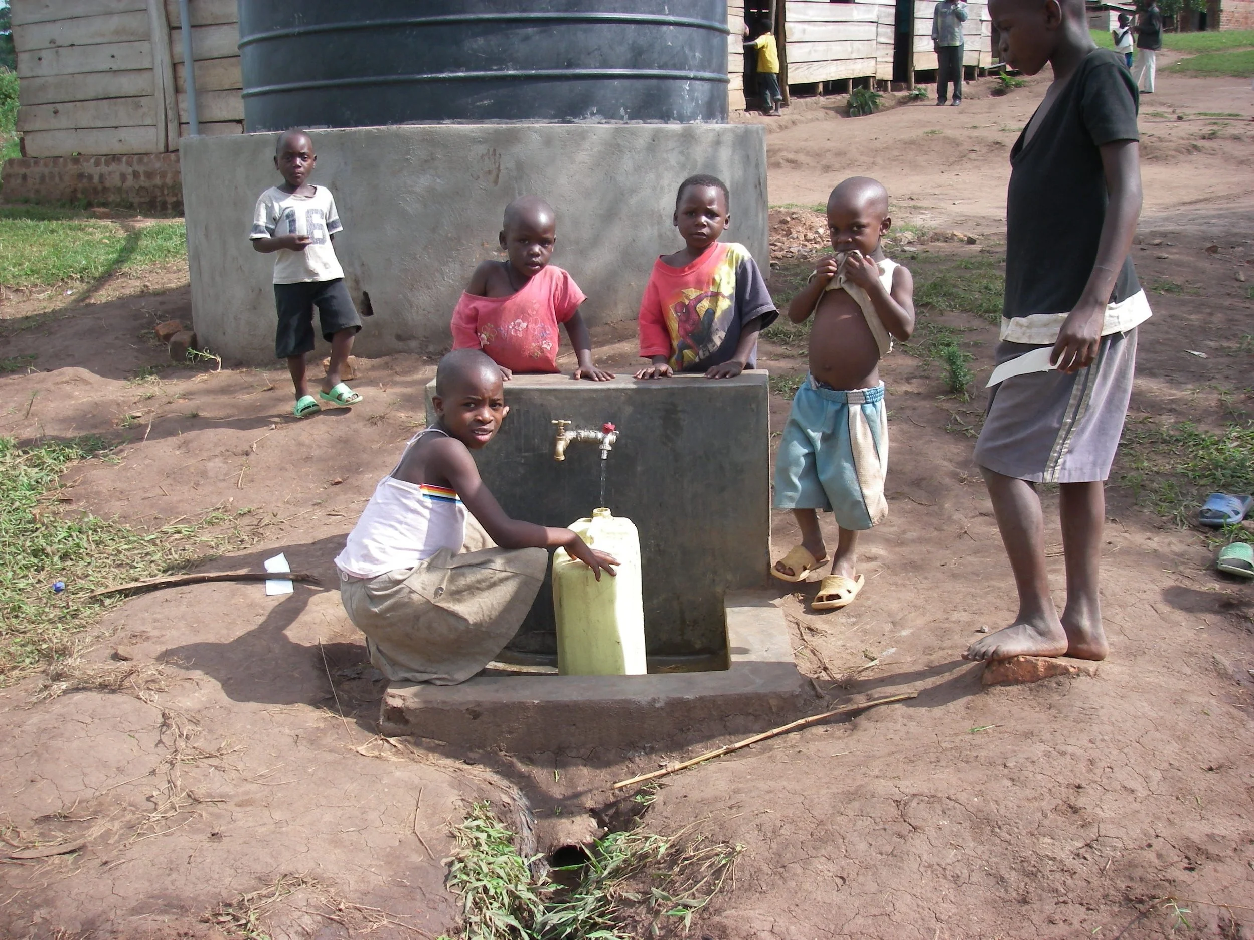 10 Kids doing water chores.jpg