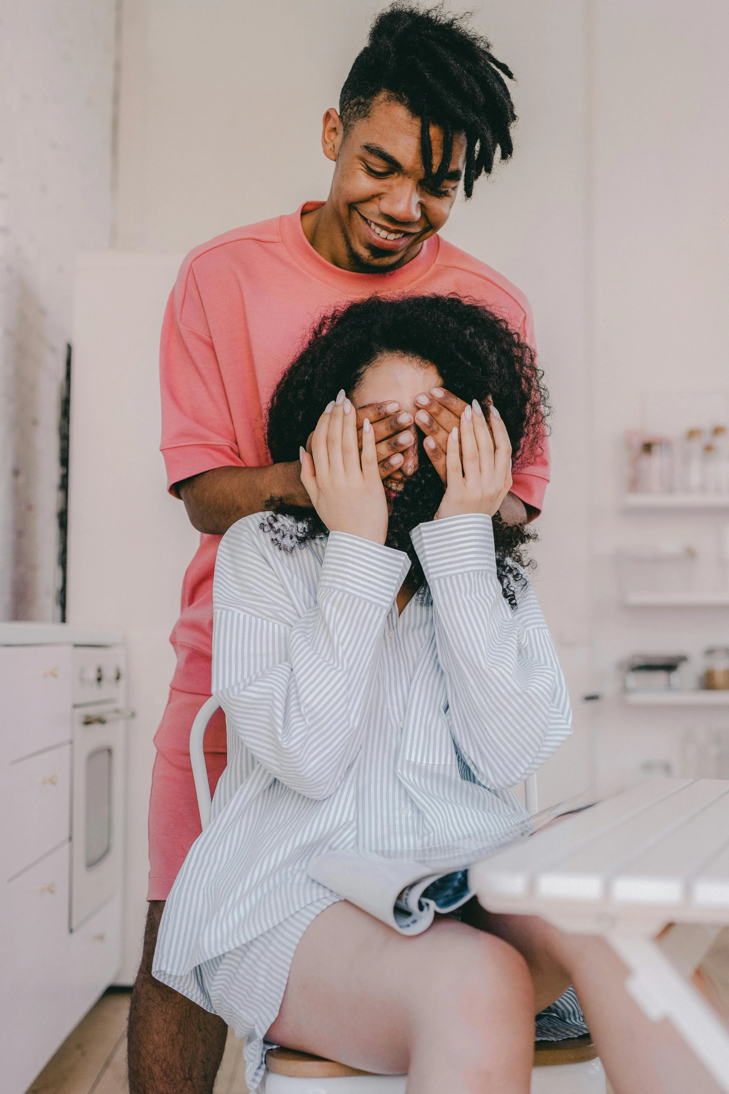 A relaxed couple smiling together, representing the intentional foundation-building work of premarital therapy in Florida at Collected Connections