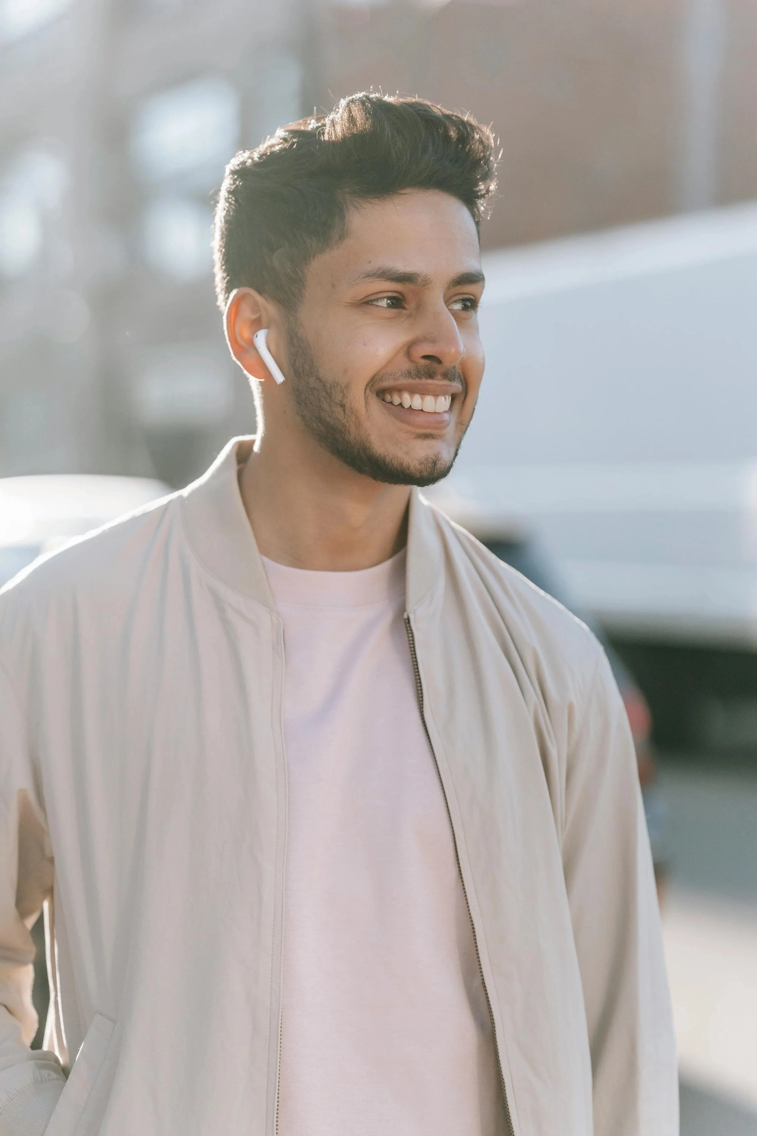 A confident, smiling man outdoors, representing the groundedness and clarity clients build through individual relationship therapy in Florida
