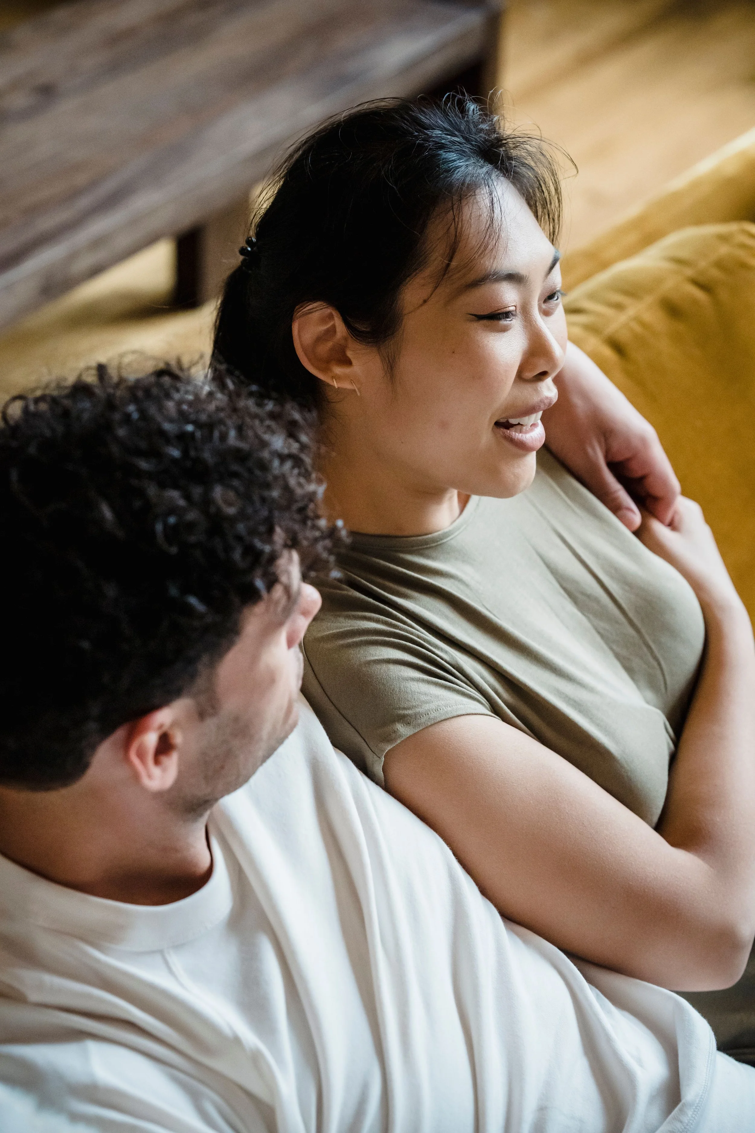 A couple sharing a quiet, present moment together, representing the relational impact of emotional regulation work offered virtually in Florida by Kristin Crumbley