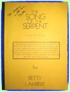 Yellow book cover titled 'The Song of the Serpent' by Betty Lambert with handwritten notes and a sticker on the cover.