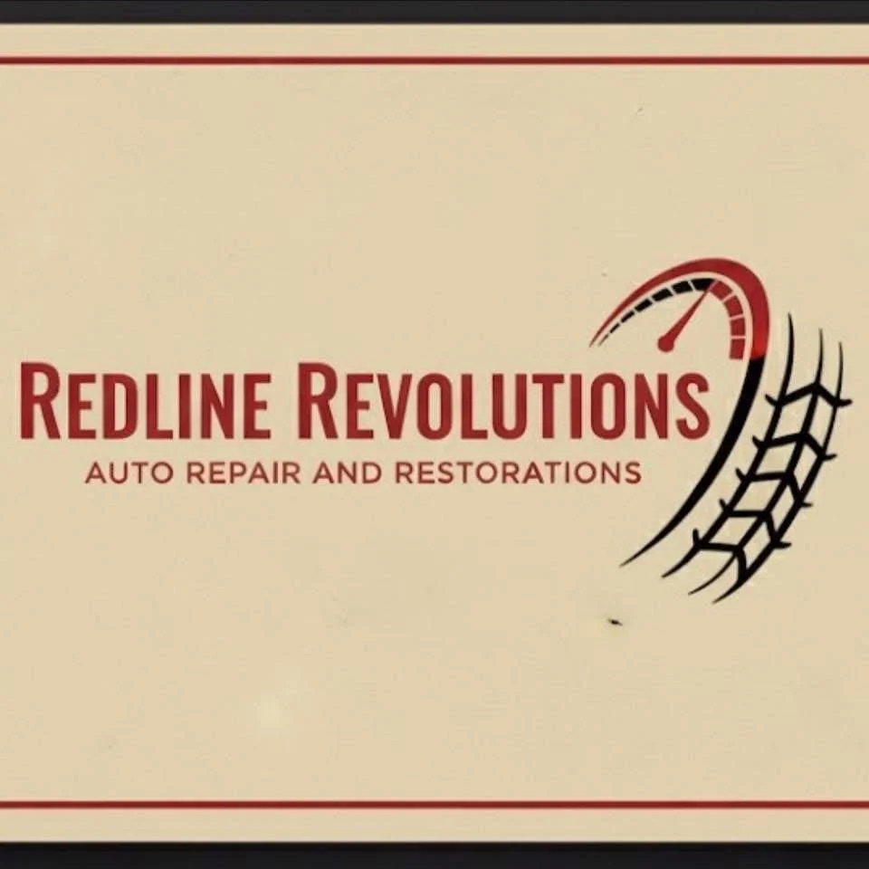 Sign for Redline Revolutions auto repair and restorations with a tire gauge and tire track graphic.